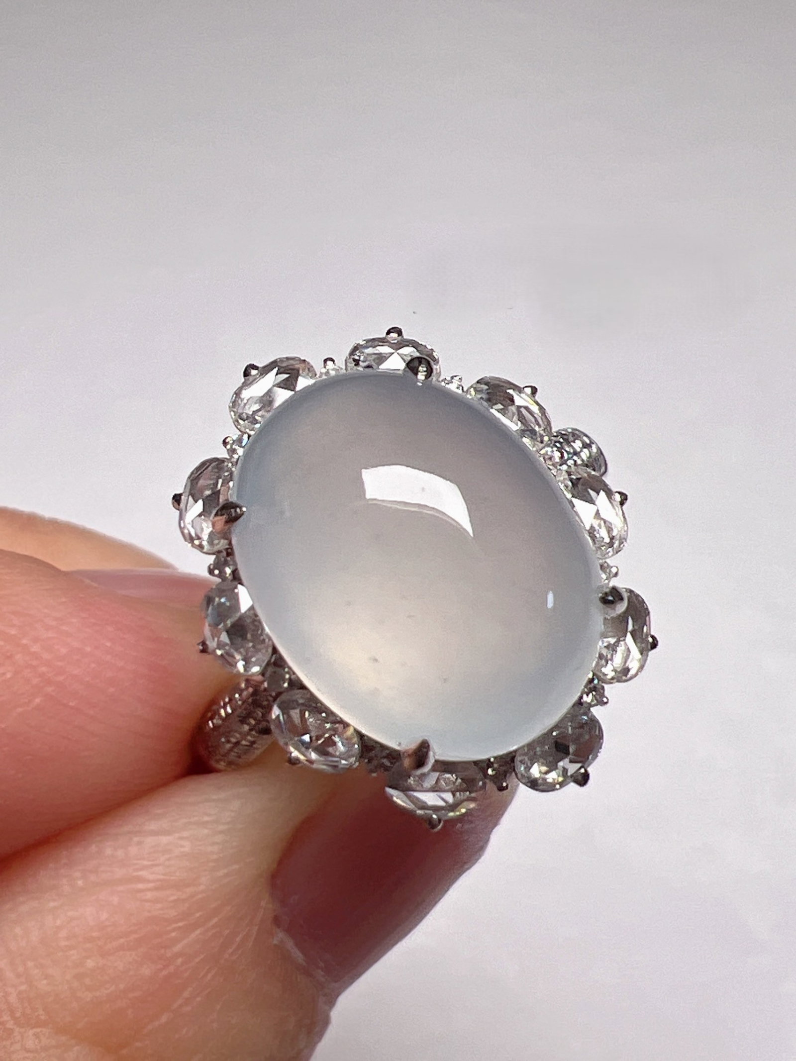 An Exquisite 18k Gold Diamond Inlaid Jadeite Ring: An Exquisite 18k Gold Diamond Inlaid Jadeite Ring,Size(Loose Stone):0.5inx0.4in #15 18k金钻镶嵌翡翠戒指