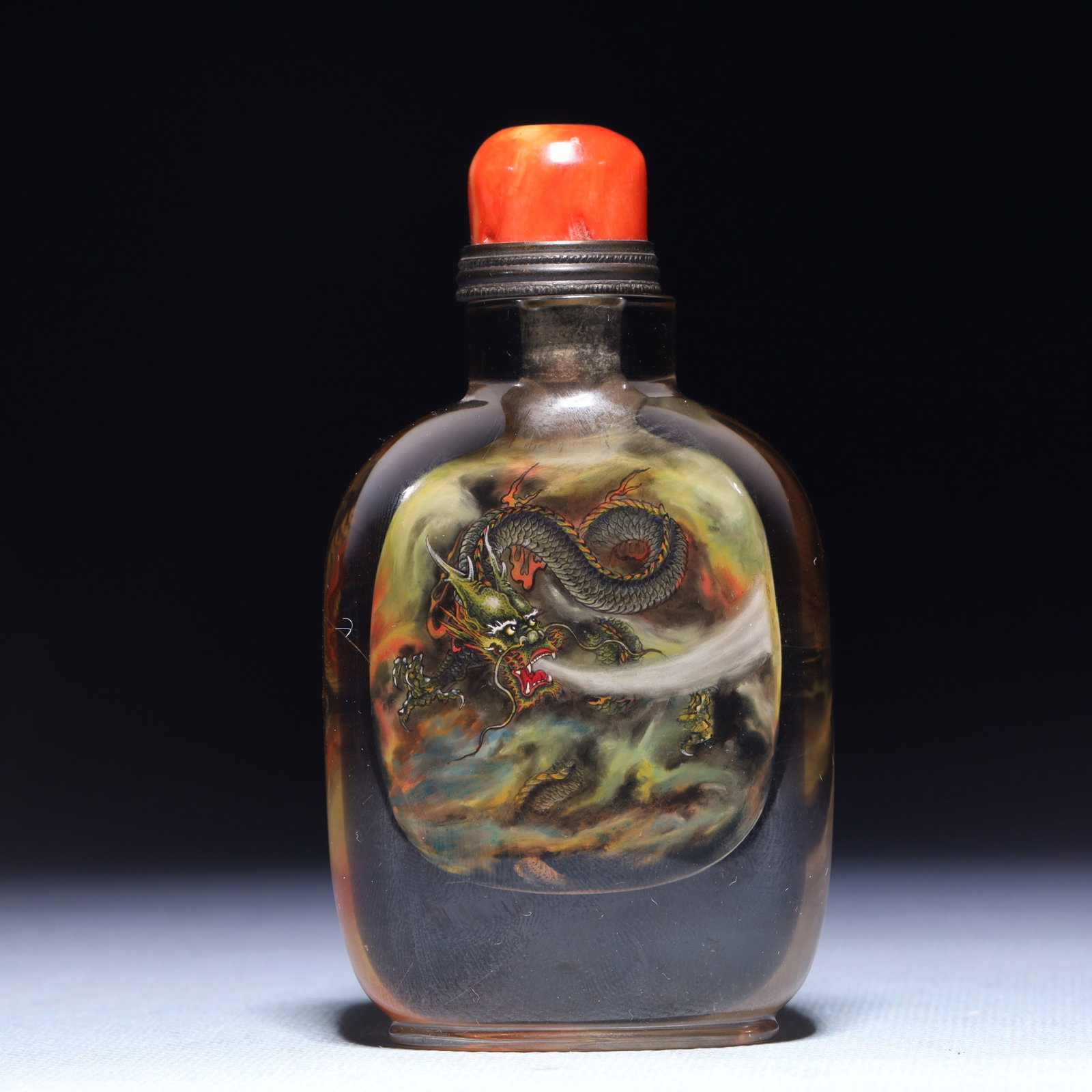 An Exquisite Crystal Dragon Pattern Snuff Bottle: An Exquisite Crystal Dragon Pattern Snuff Bottle,Qing Dynasty,China,Size:2.2inx1inx3.9in,Weight:182.5g 水晶龙纹鼻烟壶,中国清代