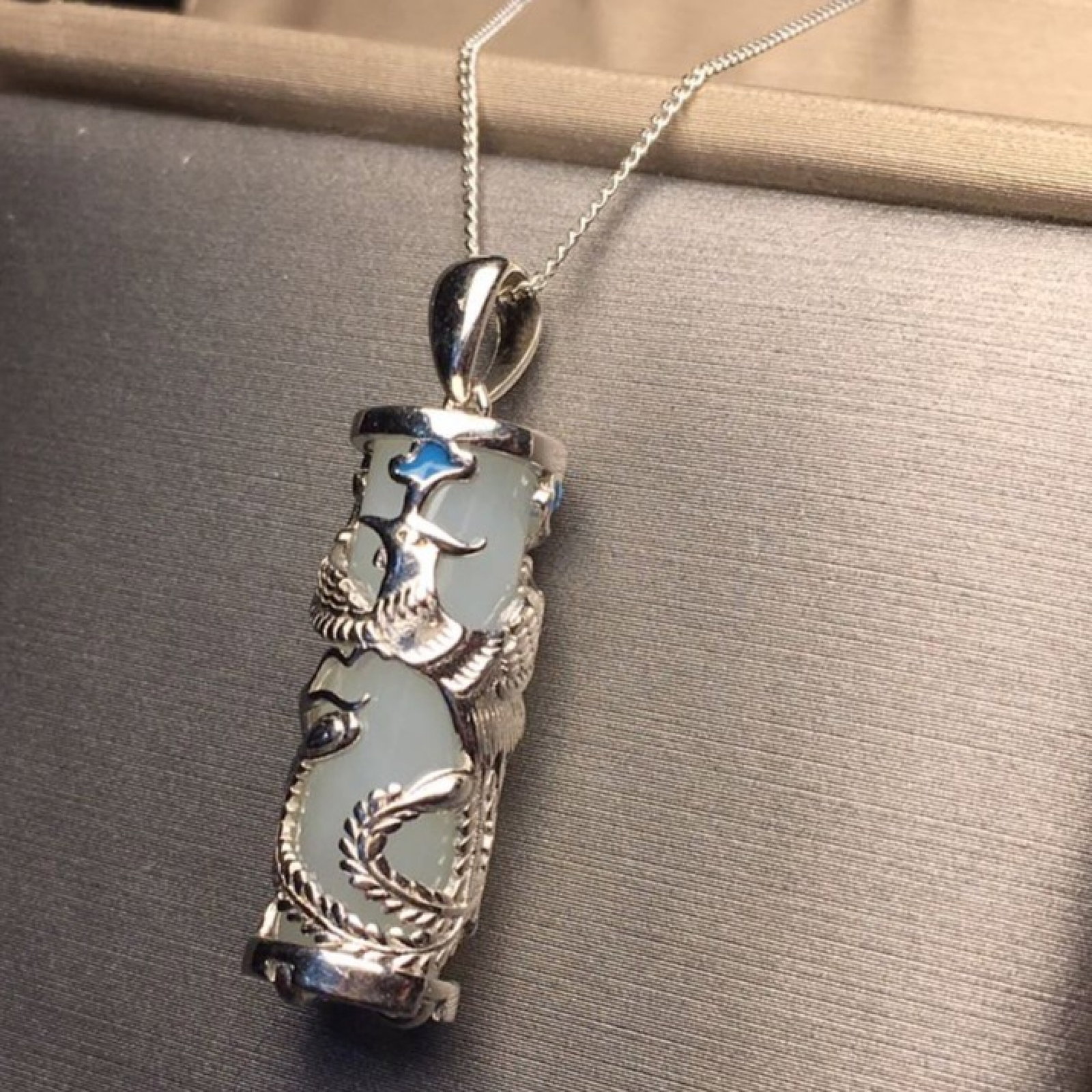 An Exquisite Sterling Silver Inlaid White Jade Necklace: An Exquisite Sterling Silver Inlaid White Jade Necklace,Size:0.3inx0.9in 纯银镶白玉项链