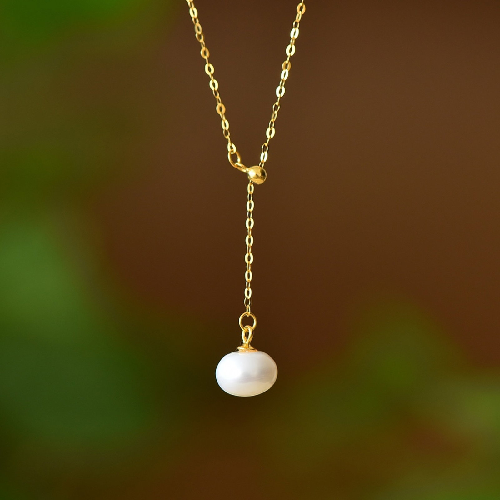 An Exquisite Sterling Silver-Gold Plated Inlaid Pearl Pendant: An Exquisite Sterling Silver-Gold Plated Inlaid Pearl Pendant 纯银镀金镶珍珠项链