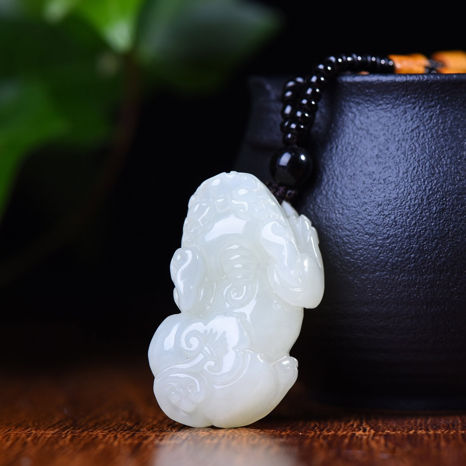 An Exquisite White Jade Wealth-Attracting Creature Pendant: An Exquisite White Jade Wealth-Attracting Creature Pendant,Size:0.8inx1.5in 白玉貔貅挂件