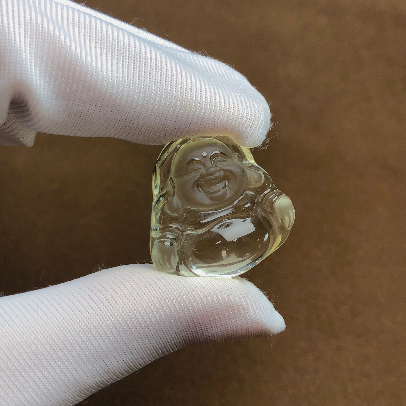 An Exquisite Crystal Maitreya Buddha Pendant: An Exquisite Crystal Maitreya Buddha Pendant,Size:1inx1inx0.4in,Weight:8.9g 水晶弥勒佛像吊坠