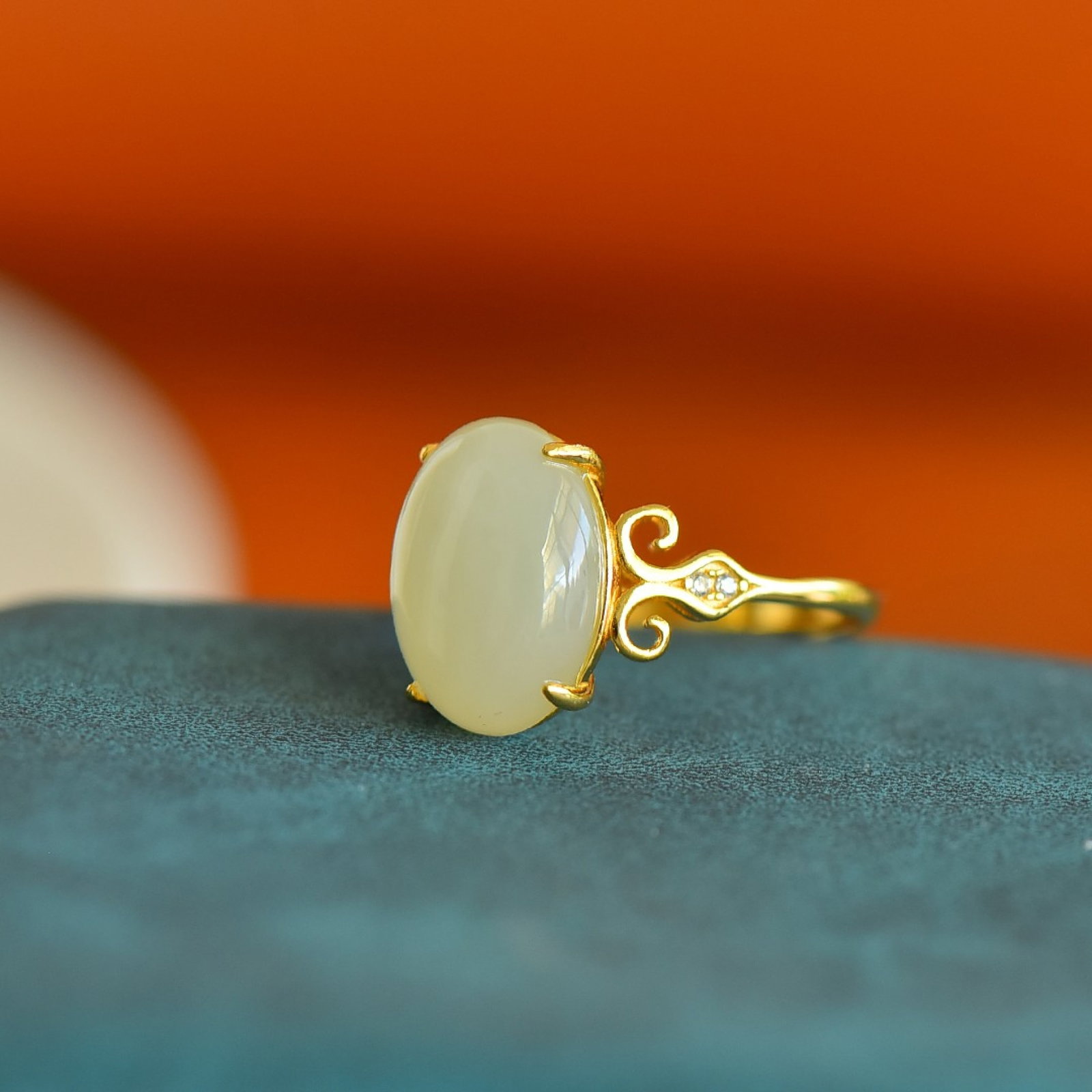An Exquisite Sterling Silver-Gold Plated Inlaid White Jade Ring: An Exquisite Sterling Silver-Gold Plated Inlaid White Jade Ring,Size:0.4inx0.6in 纯银镀金镶白玉戒指