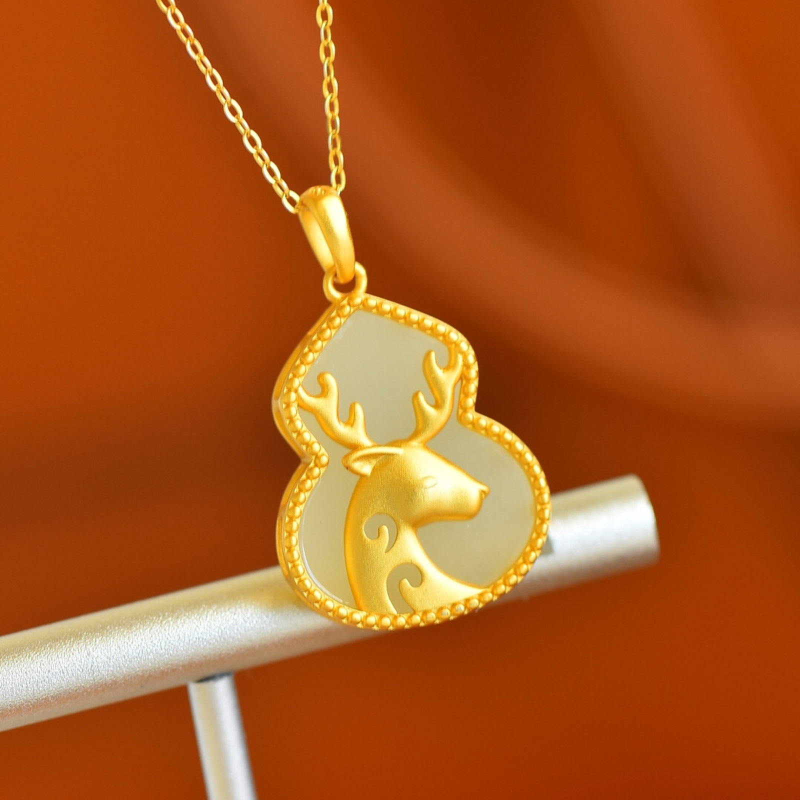 An Exquisite Sterling Silver-Gold Plated Inlaid White Jade Gourd-Shaped Pendant: An Exquisite Sterling Silver-Gold Plated Inlaid White Jade Gourd-Shaped Pendant , Size :0.6inx0.8in
