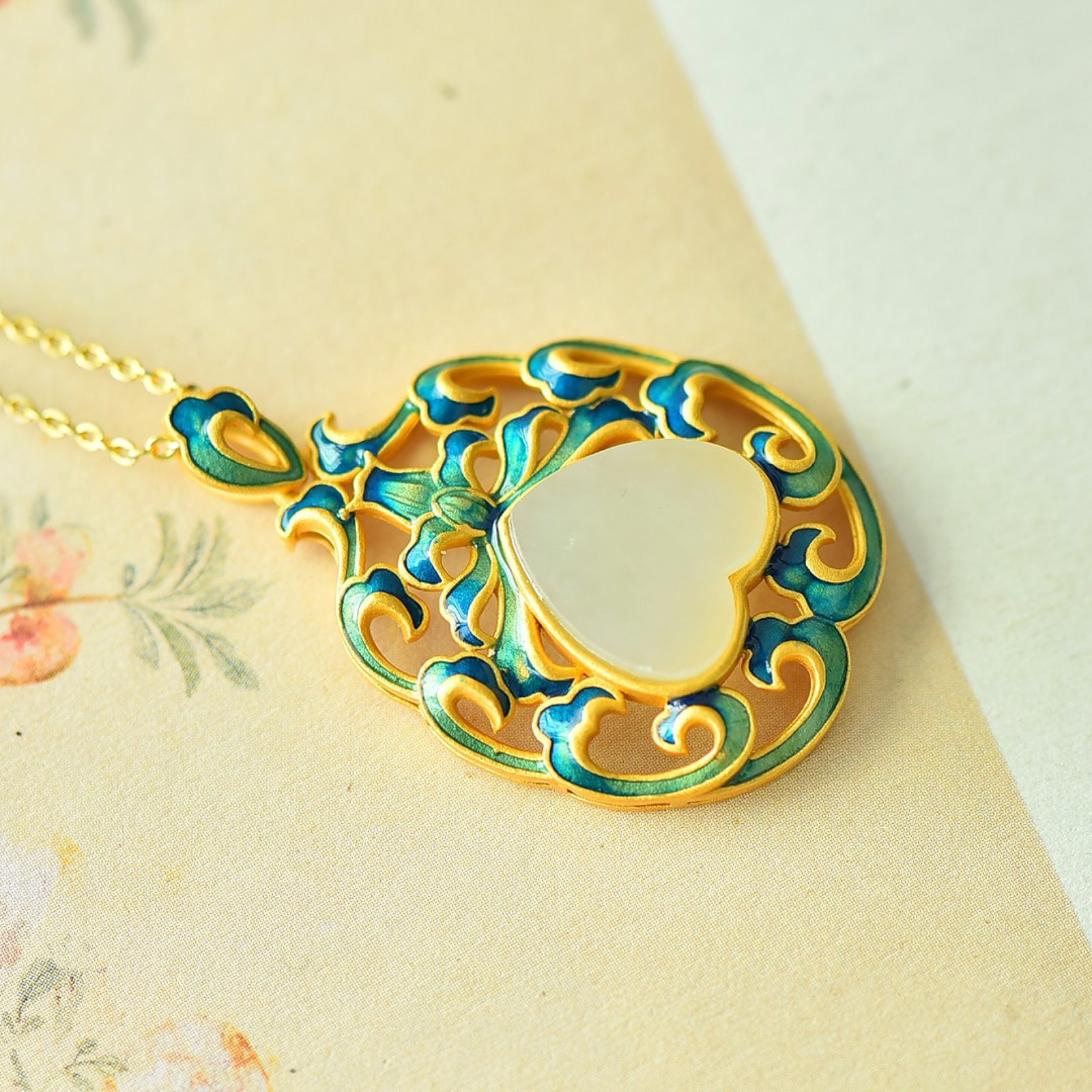 An Exquisite Sterling Silver-Gold Plated Inlaid White Jade Enamel Pendant: An Exquisite Sterling Silver-Gold Plated Inlaid White Jade Enamel Pendant 纯银镀金镶白玉珐琅吊坠