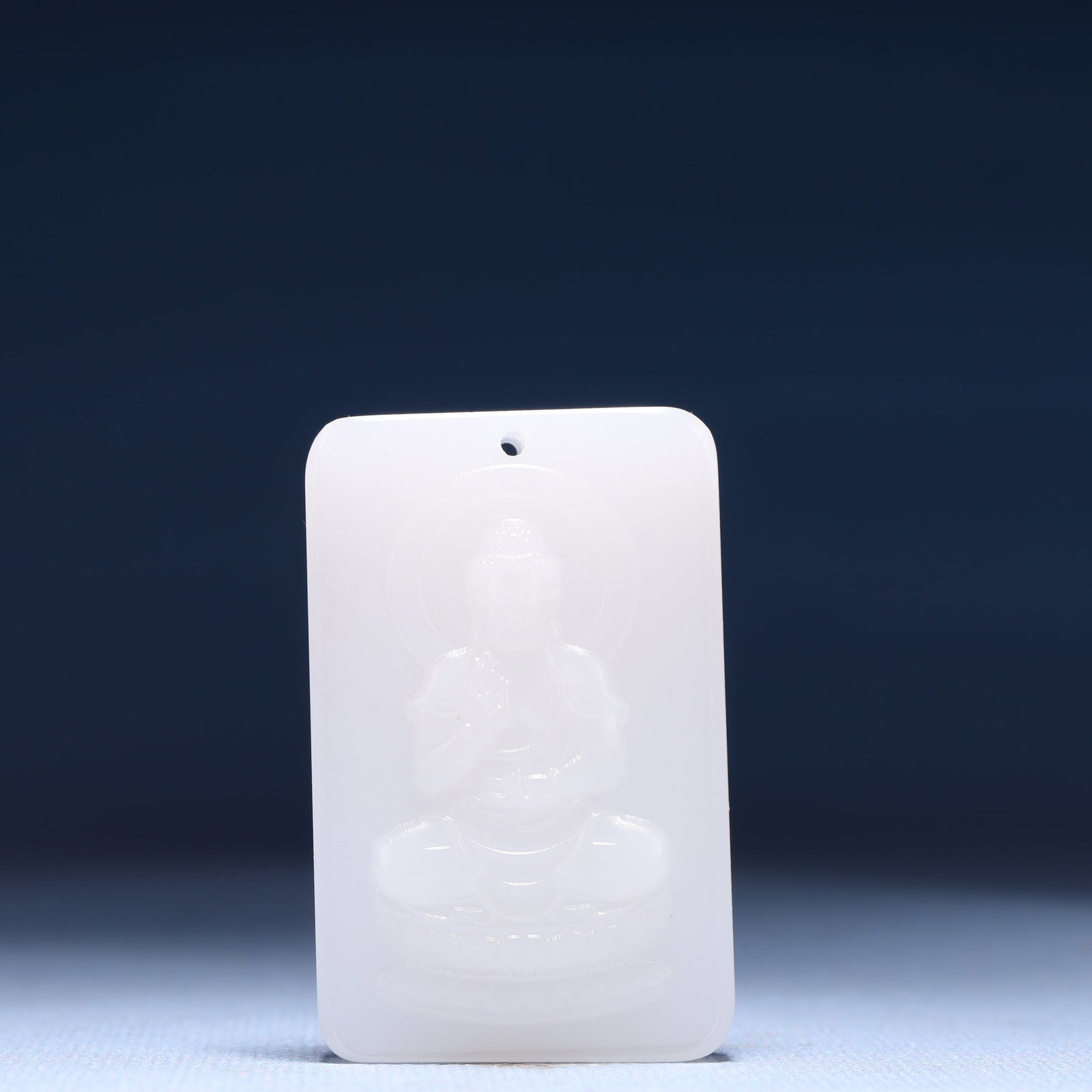 An Exquisite White Jade Statue of Sakyamuni Pendant: An Exquisite White Jade Statue of Sakyamuni Pendant,Size:1.4inx0.4inx2.2in,Weight:47g 白玉如来像牌
