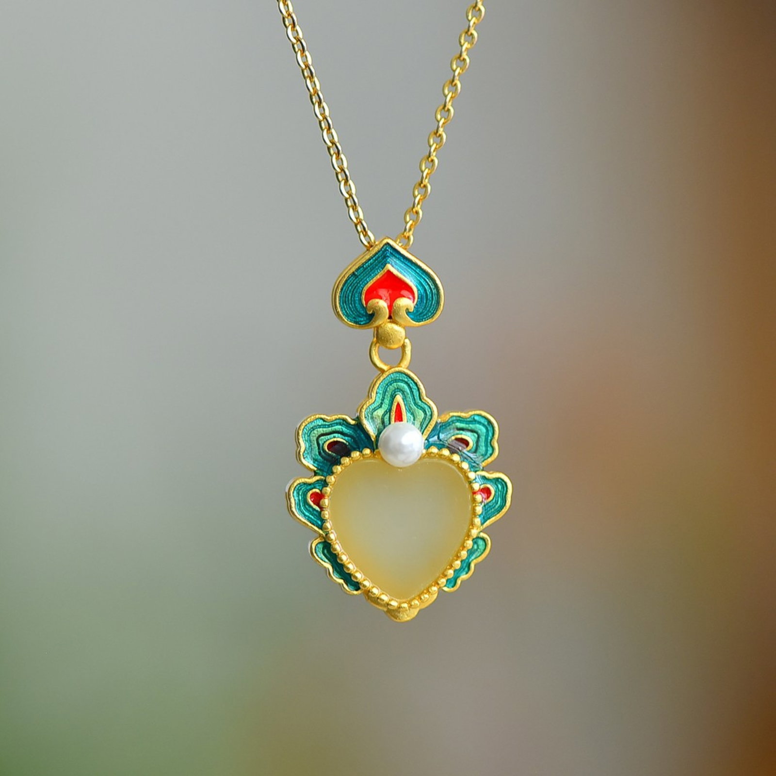An Exquisite Sterling Silver-Gold Plated Inlaid White Jade Pendant: An Exquisite Sterling Silver-Gold Plated Inlaid White Jade Pendant 纯银镀金镶白玉吊坠