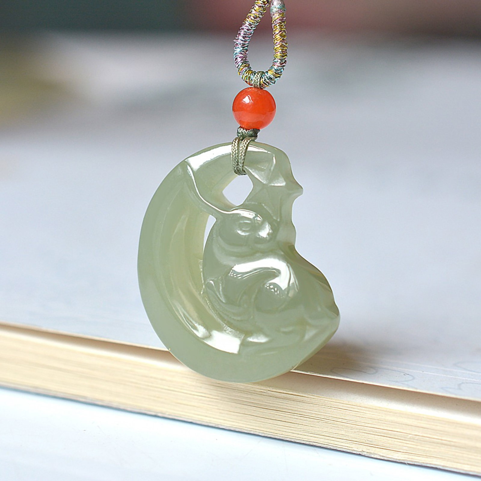 An Exquisite Greenish Jade Rabbit Pendant: An Exquisite Greenish Jade Rabbit Pendant,Size:0.7inx0.9in 青玉兔挂件