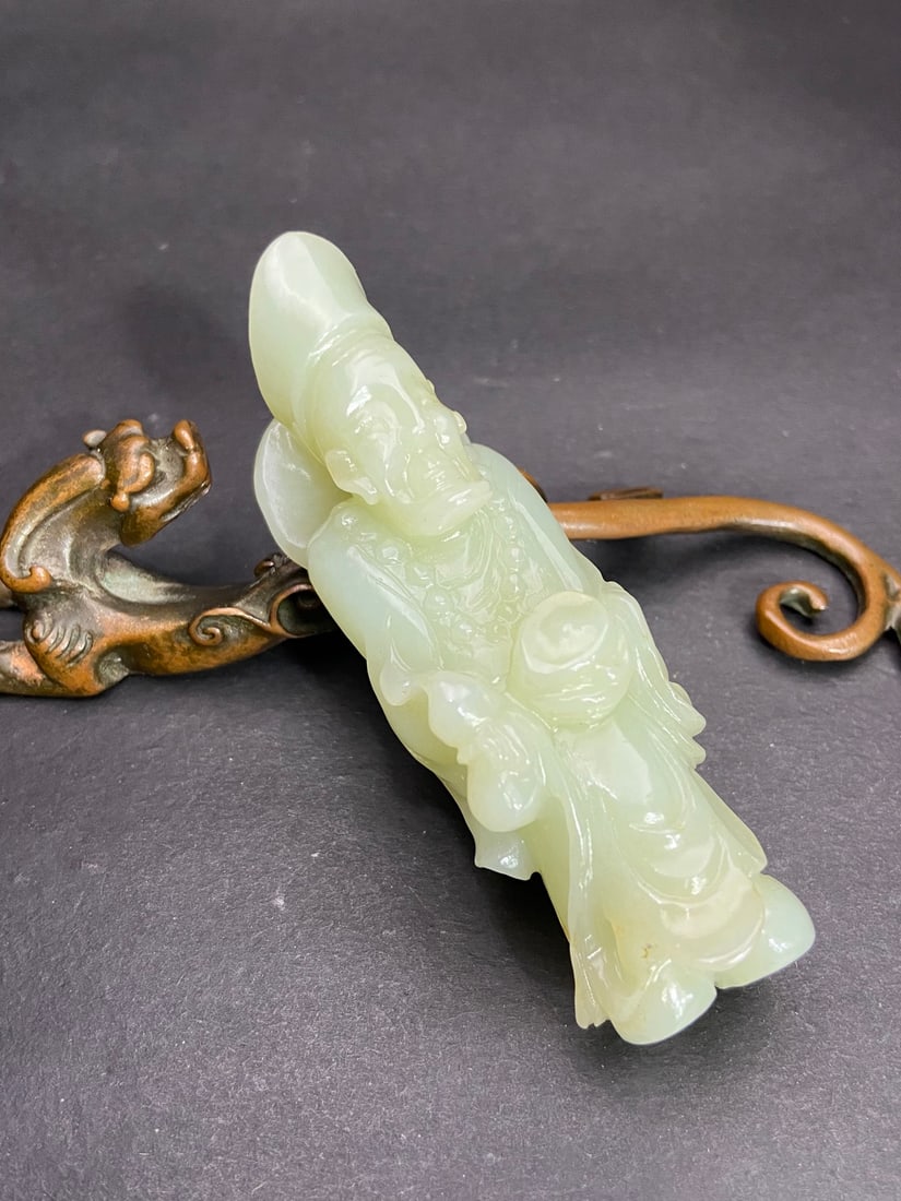 An Exquisite White Jade Figure Hand Piece: An Exquisite White Jade Figure Hand Piece,Qing Dynasty,China,Size:3.7inx1.2inx1.2in,Weight:105g白玉人物手把件,中国清代,Size:9.3cmx3cmx