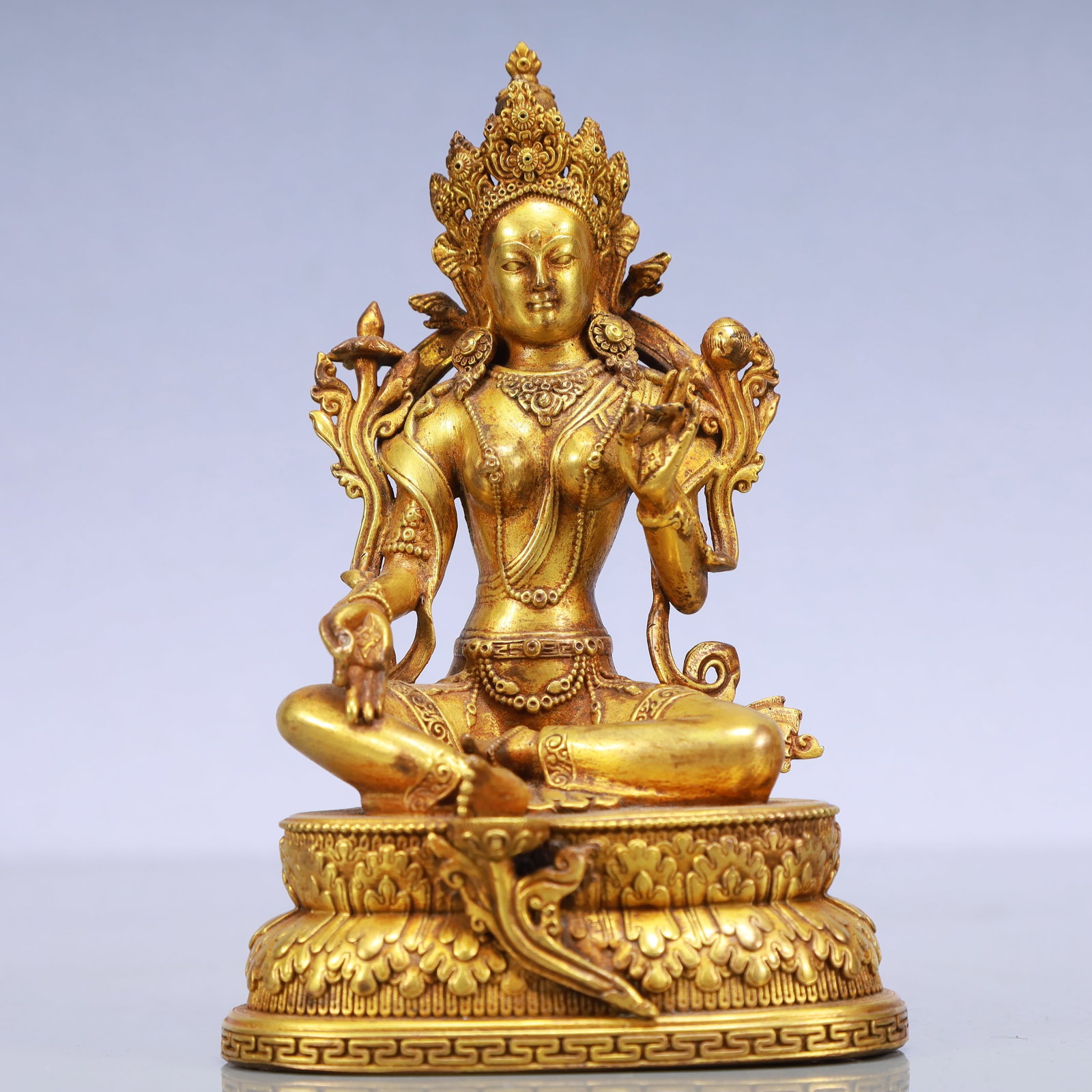 An Exquisite Gilt Bronze Statue of Tara: An Exquisite Gilt Bronze Statue of Tara Ming Dynasty, China Size:3.9inx2.8inx5.9in Weight:650g铜鎏金度母佛像 中国明代 Size:10cmx7cmx15