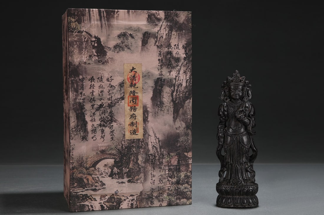 A Solemn Eaglewood Statue of Avalokitesvara: A Solemn Eaglewood Statue of Avalokitesvara,Qing Dynasty,ChinaSize:3inx2inx9.4in沉香木观音像,中国清代,Size:7.5cmx5.2cmx24cm