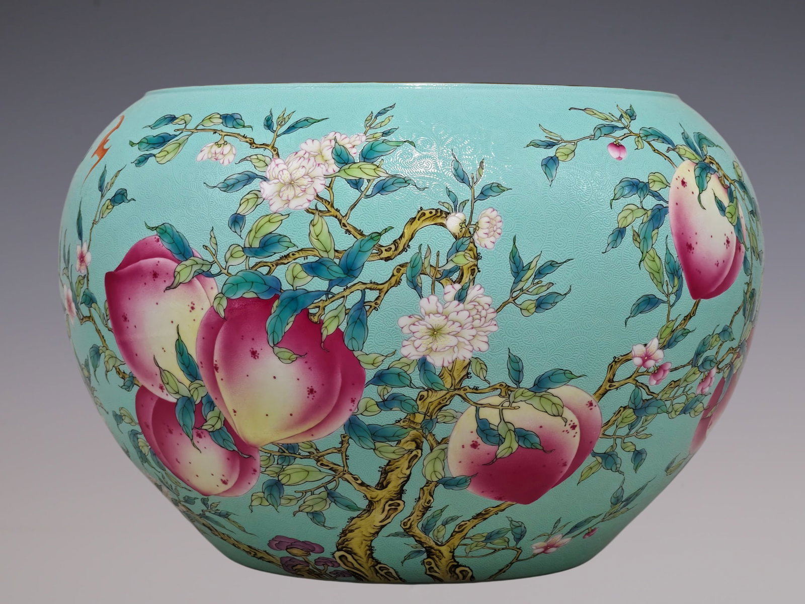 An Exquisite Famille-Rose Bats and Peach Pattern Vat: An Exquisite Famille-Rose Bats and Peach Pattern Vat Qing Dynasty, China Qianlong Six-character Mark Size:11inx16.5in松石绿扒花五福九桃纹