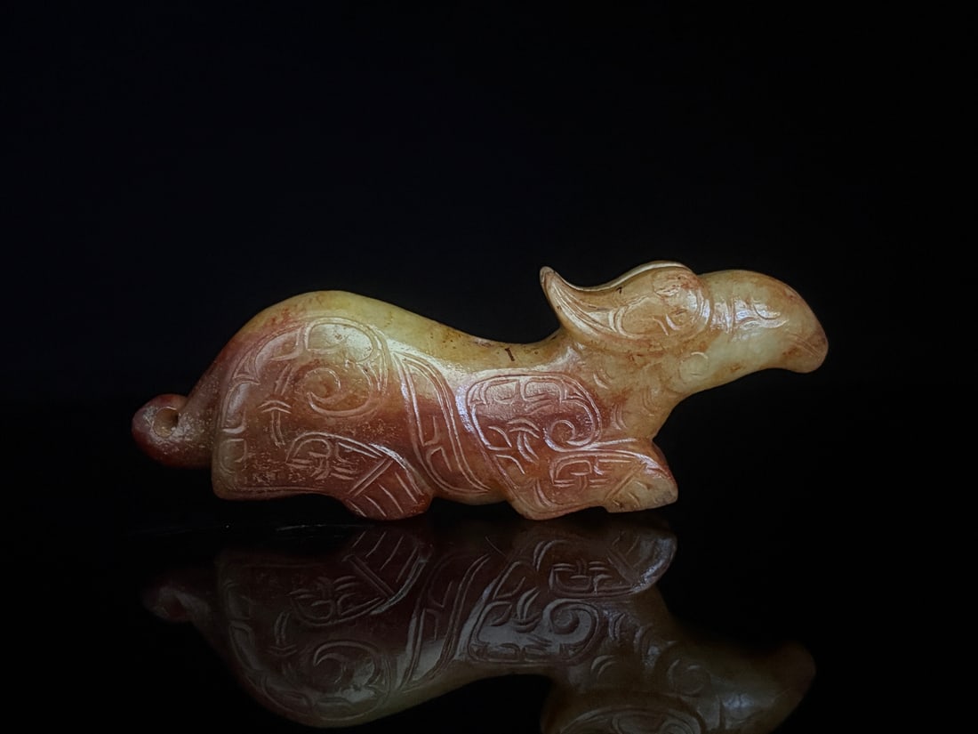 An Exquisite White Jade Auspicious Beast Pendant: An Exquisite White Jade Auspicious Beast Pendant,the Sang and Zhou in Period in China,Size:4.6inx1.6inx1in,Weight:168g白玉瑞兽挂件,中国商周&