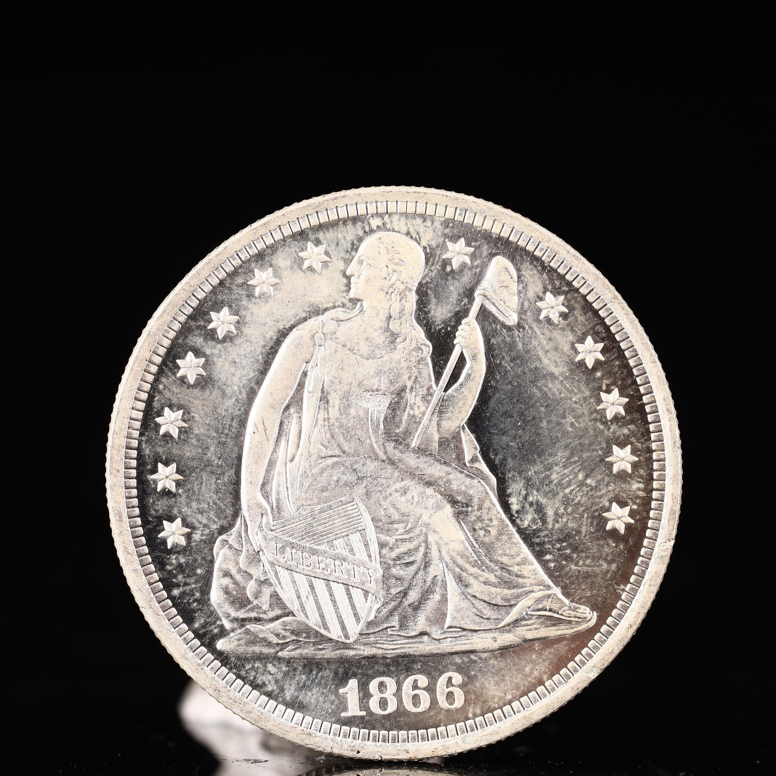 USA One Dollar 1866 Coin: American coin. IN GOD WE TRUST / LIBERTY / 1866 / UNITED STATES OF AMERICA / ONE DOL. Weight:26.9g.
