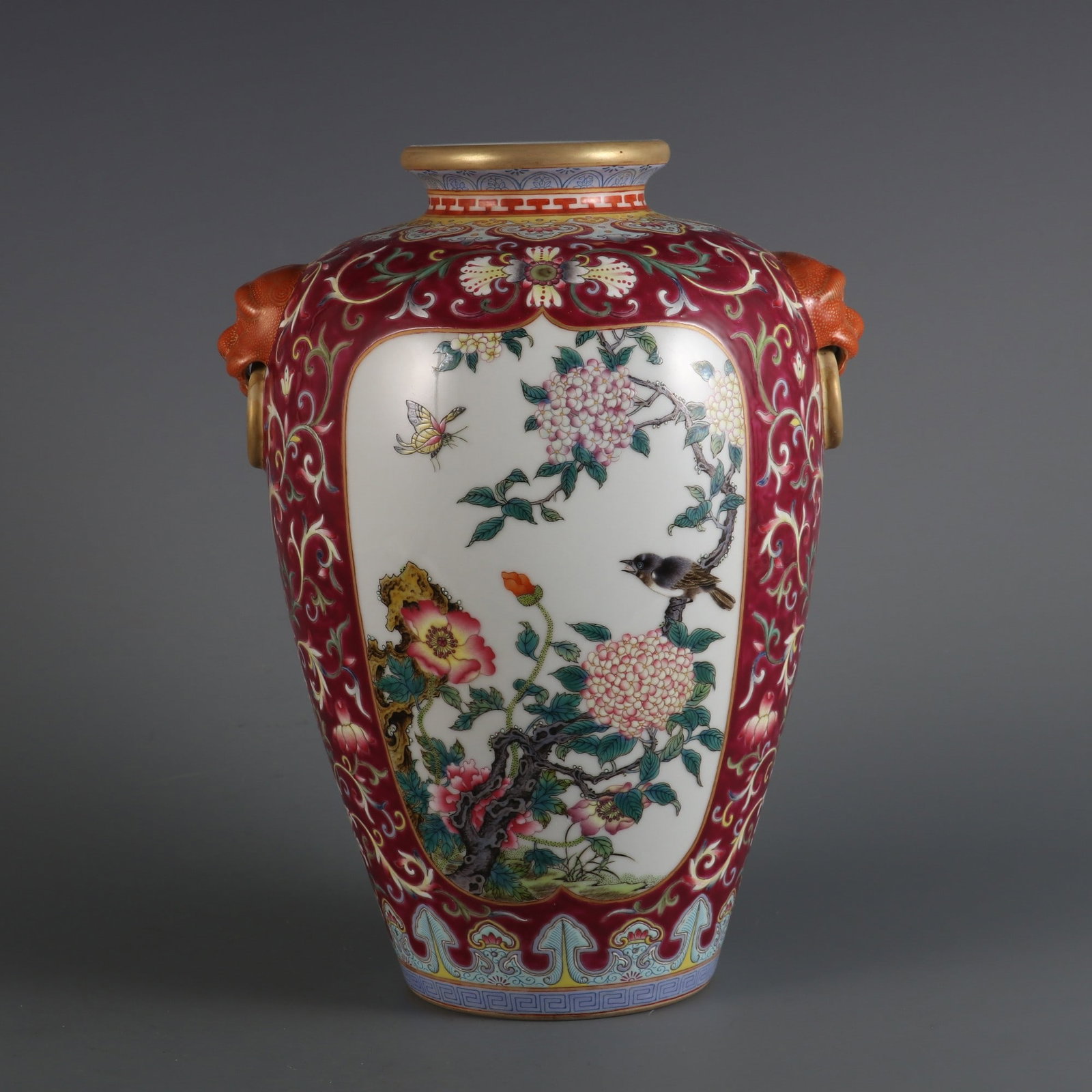 An Exquisite Famille-Rose Ruby Red-Glazed Lotus Pattern Flower and Bird Pattern Double-Ears Jar: An Exquisite Famille-Rose Ruby Red-Glazed Lotus Pattern Flower and Bird Pattern Double-Ears Jar Qing Dynasty, China Qianlong Six-character MarkSize:10.6inx6.9in粉彩胭脂红