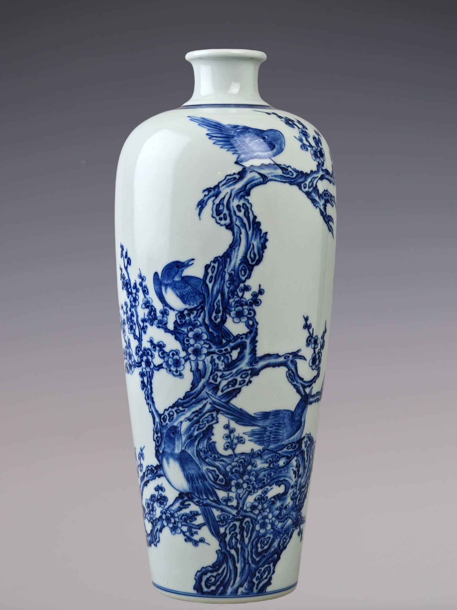An Exquisite Blue and White Flower and Bird Pattern Vase: An Exquisite Blue and White Flower and Bird Pattern Vase Qing Dynasty, China Yongzheng Six-character Mark Size:14inx5.9in青花喜鹊登梅纹梅瓶 ߑ