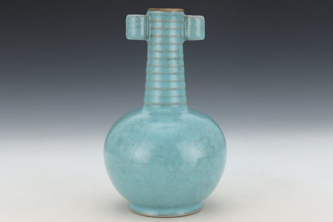 An Exquisite Ru yao Double-Ears Vase: An Exquisite Ru yao Double-Ears Vase Song Dynasty, China Size:7.3inx4.4in汝窑天蓝釉冰裂纹弦纹贯耳瓶 中国ध