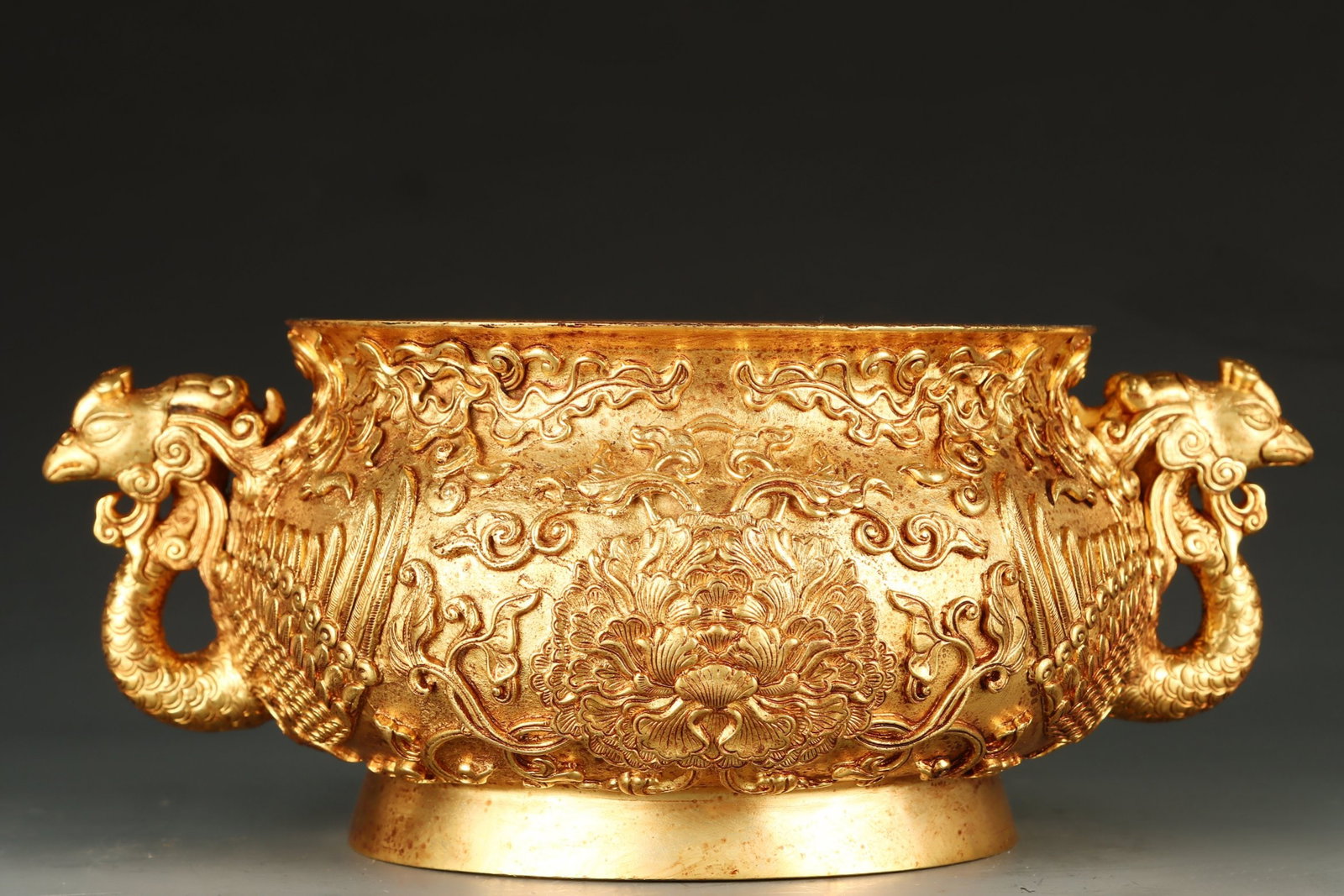 An Exquisite Gilt Bronze Lotus Pattern Phoenix-Ears Censer: An Exquisite Gilt Bronze Lotus Pattern Phoenix-Ears Censer,Qing Dynasty,China,Qianlong Four-character Mark,Size:3.9inx8.7in,Weight:2028g铜鎏金缠枝莲纹凤