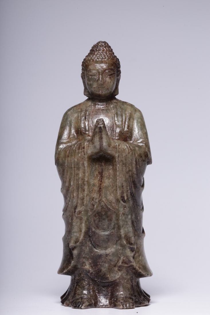 An Exquisite Archaic Jade Statue of Sakyamuni: An Exquisite Archaic Jade Statue of Sakyamuni,Qing Dynasty, ChinaSize:4.3inx1.6inx1.4in,Weight:178g高古玉释迦摩尼像,中国清代,Siz