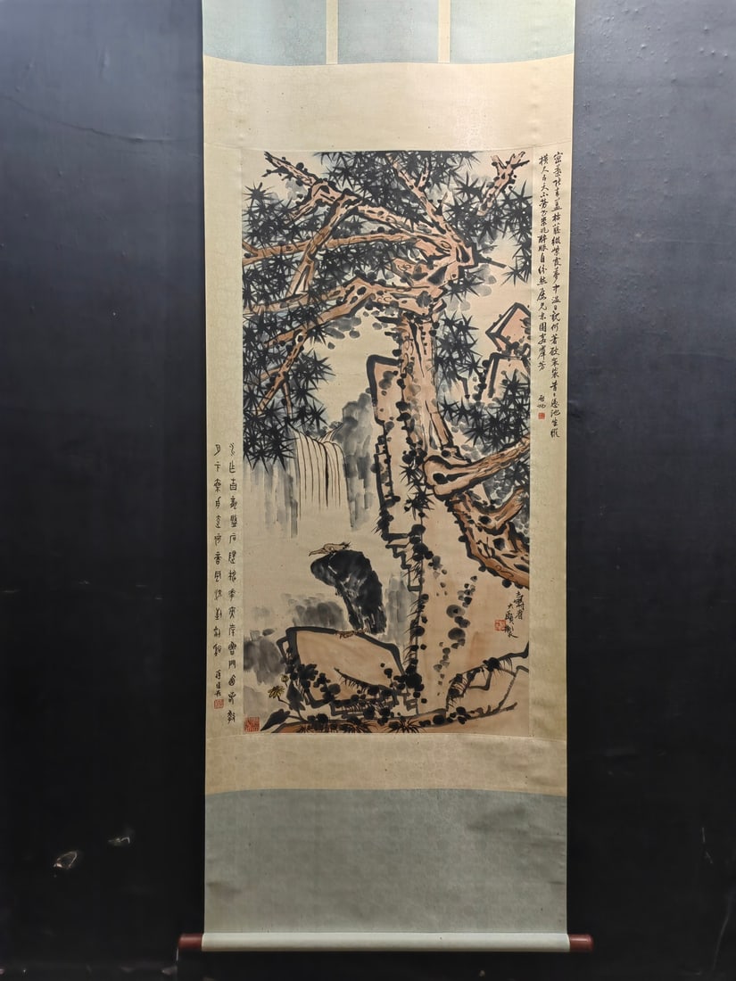A Chinese Vertical Scroll Ink Painting of Pine and Eagle on Paper,Pan Tianshou: A Chinese Vertical Scroll Ink Painting of Pine and Eagle on Paper,Pan TianshouSize:26.3inx53.5in一幅中国水墨松鹰图立轴,潘天