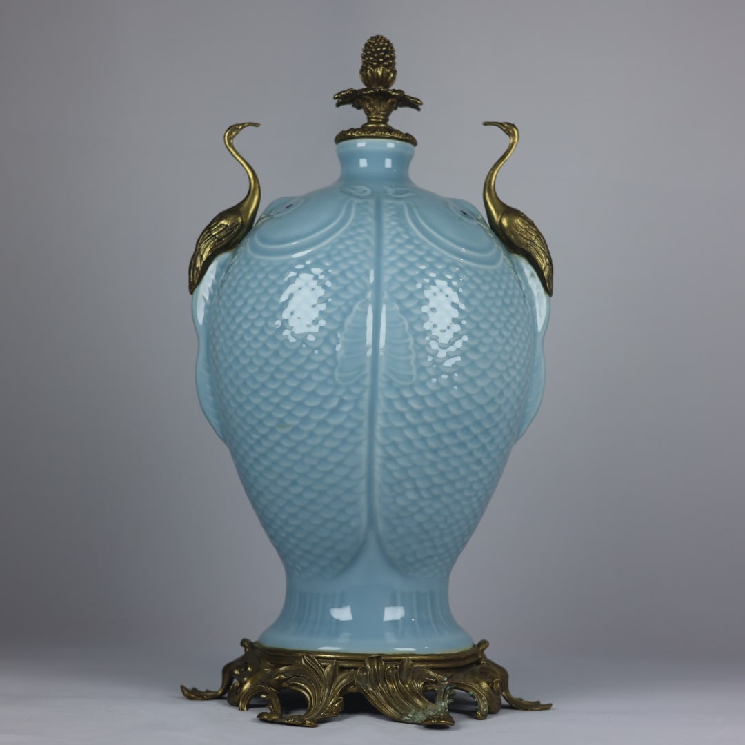 A Huge Sky Blue Glazed Inlaid Bronze Fish Pattern Crane-Ears Vase: A Huge Sky Blue Glazed Inlaid Bronze Fish Pattern Crane-Ears Vase,Qing Dynasty,China,Qianlong Six-character Mark,Size:18.5inx9.4inx9.4in天青釉镶铜鱼纹鹤