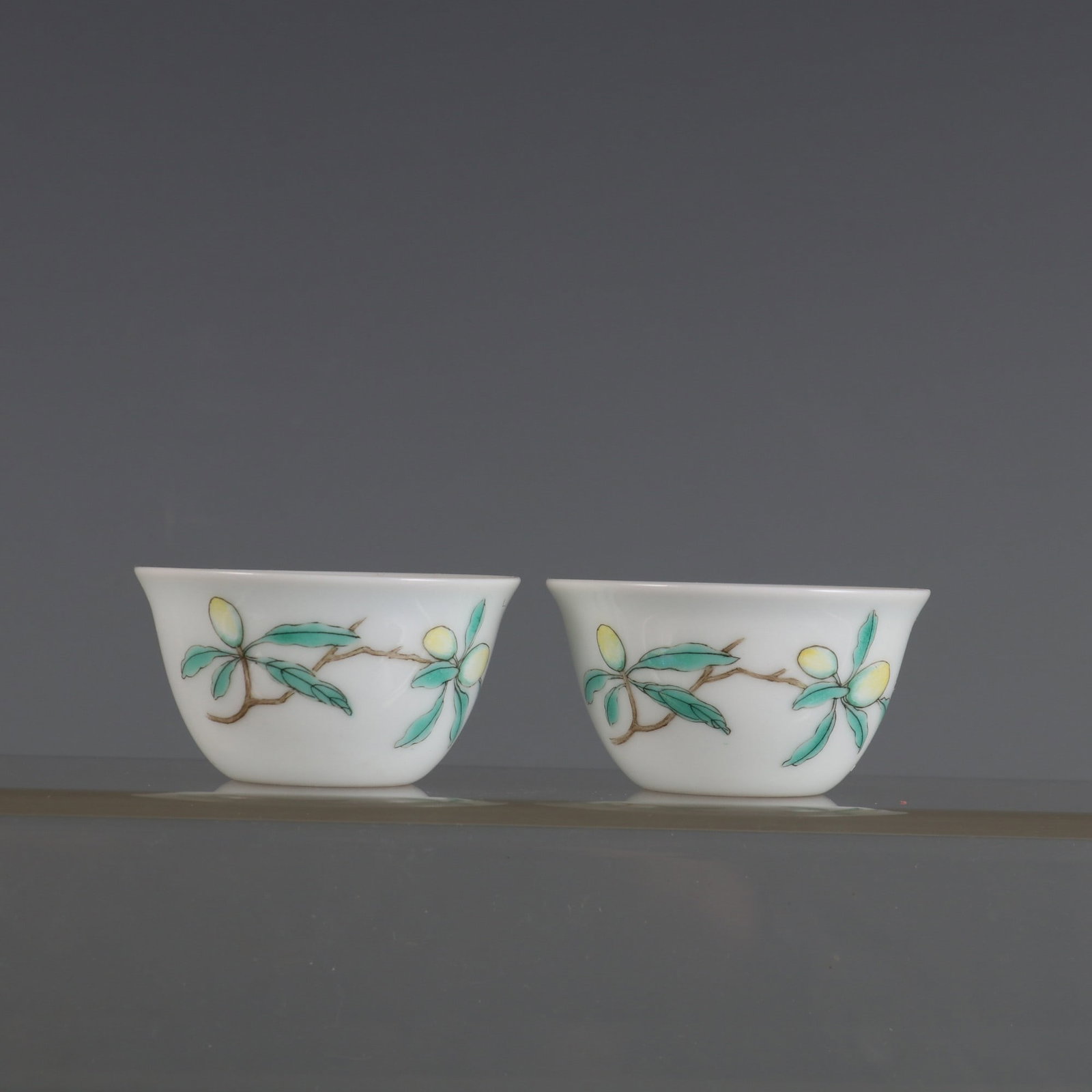 A Pair of Exquisite Famille-Rose Flower and Butterfly Pattern Cup: A Pair of Exquisite Famille-Rose Flower and Butterfly Pattern Cup Qing Dynasty, China Yongzheng Four-character MarkSize:1.2inx2.2in一对粉彩花卉蝴蝶ń