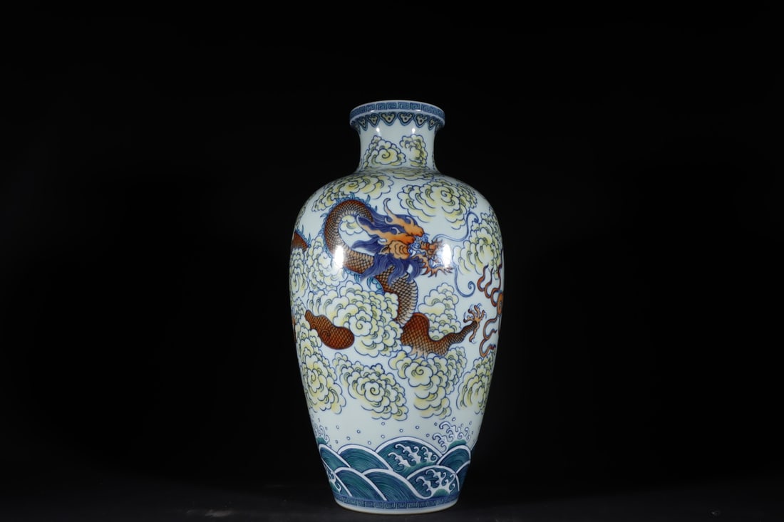 An Exquisite Doucai Seawater Pattern Dragon Pattern Vase: An Exquisite Doucai Seawater Pattern Dragon Pattern Vase Qing Dynasty, China Qianlong Six-character Mark Size:16.1inx8.7in斗彩云龙纹瓶 中国清É