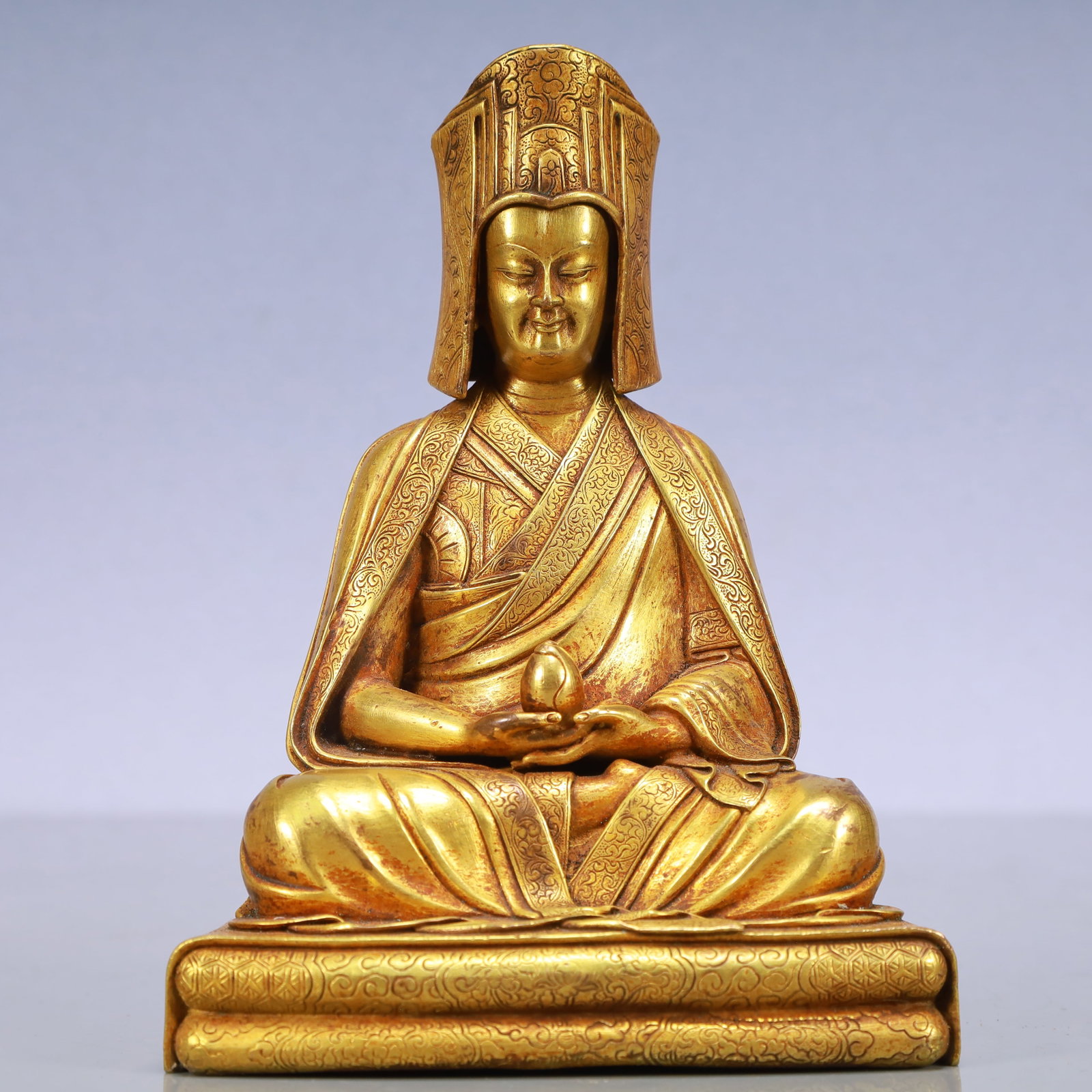 An Exquisite Gilt Bronze Statue of Tsongkhapa: An Exquisite Gilt Bronze Statue of Tsongkhapa Ming Dynasty, China Size:4.5inx3.3inx5.9in Weight:1300g铜鎏金宗喀巴佛像 中国明代 S