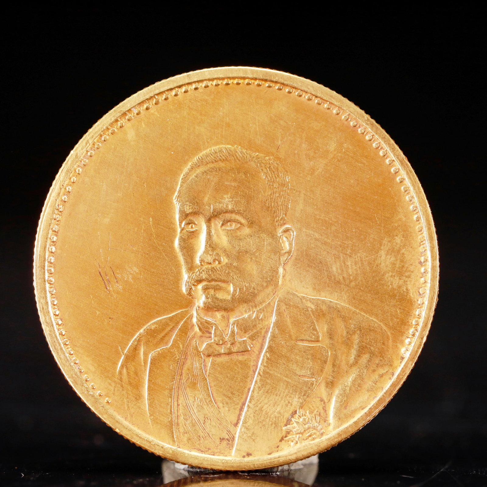 An Exquisite Sterling silver-Gilt Coin: An Exquisite Sterling silver-Gilt Coin, The Republic of China, Size:1.5in Weight:37.5g