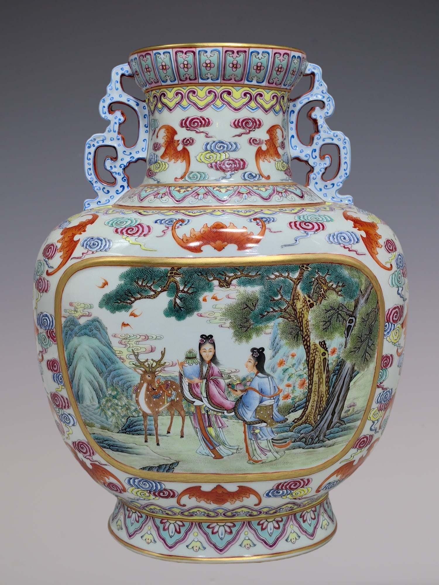 An Exquisite Famille-Rose Bats and Peach Pattern Character and Story Pattern Double-Ears Vase: An Exquisite Famille-Rose Bats and Peach Pattern Character and Story Pattern Double-Ears Vase Qing Dynasty, China Qianlong Six-character Mark Size:13.8inx10.6in粉彩麻姑献