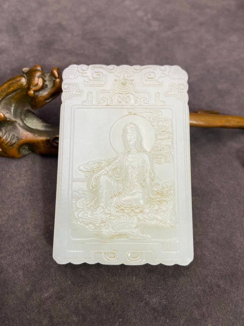 An Exquisite White Jade Statue of Avalokitesvara Pattern Pendant,With Poem: An Exquisite White Jade Statue of Avalokitesvara Pattern Pendant,With Poem,Qing Dynasty,China,Size:2.6inx1.7inx0.4in,Weight:78g白玉观音像纹挂件,带