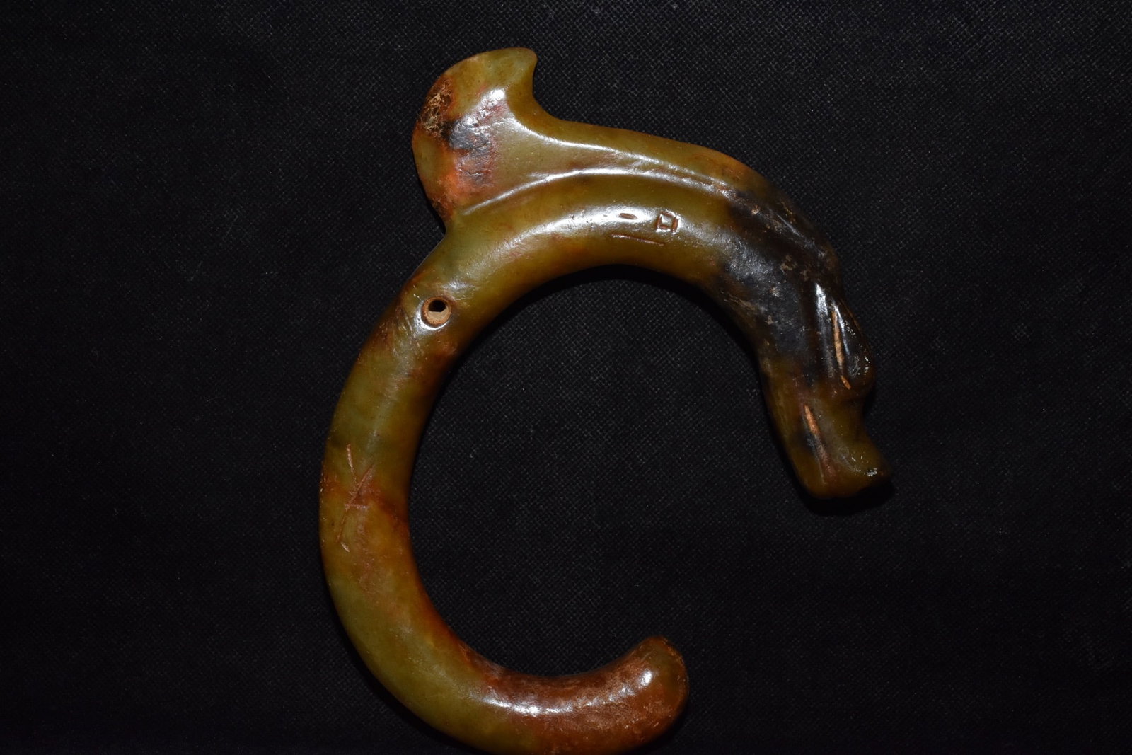 An Exquisite White Jade Pig-Dragon Pendant: An Exquisite White Jade Pig-Dragon Pendant,Hongshan Culture,Size:6.7inx7.9in,Weight:540g白玉猪龙挂件，红山文化，Size:17cmx20cm,W