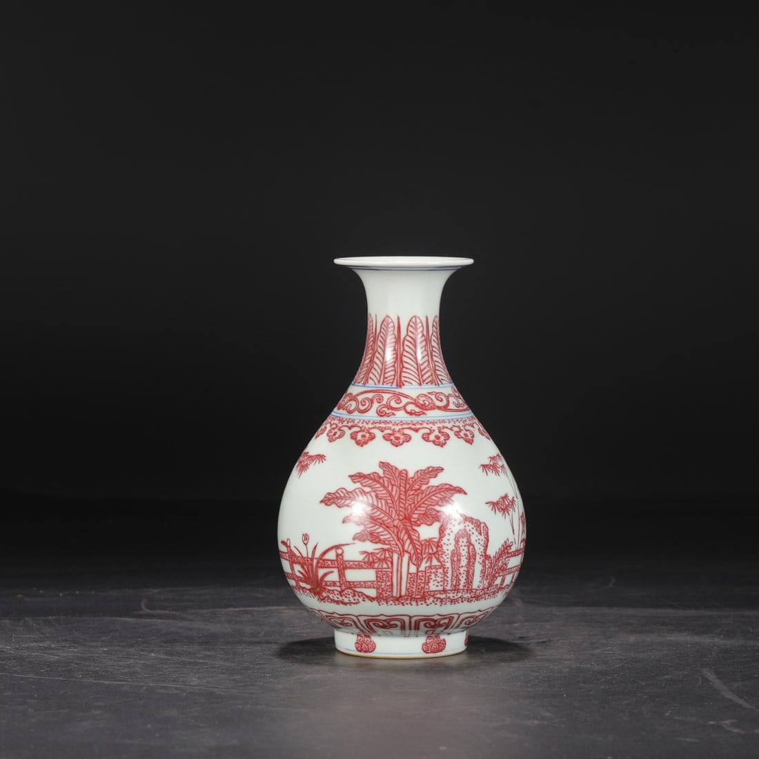 An Exquisite Underglaze-Red Bamboo Pattern Banana Leaf Pattern Vase: An Exquisite Underglaze-Red Bamboo Pattern Banana Leaf Pattern Vase Qing Dynasty, China Qianlong Six-character Mark Size:8.5inx5.1in釉里红竹石芭蕉如