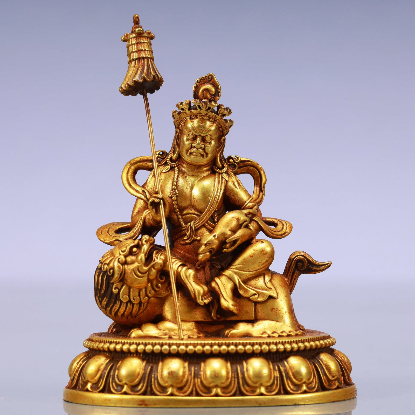 An Exquisite Gilt Bronze Statue of Mammon Rides the Lion: An Exquisite Gilt Bronze Statue of Mammon Rides the Lion Ming Dynasty, China Yongle Six-character Mark Size:3.3inx2.4inx3.7in Weight:698g铜鎏金骑狮财神佛