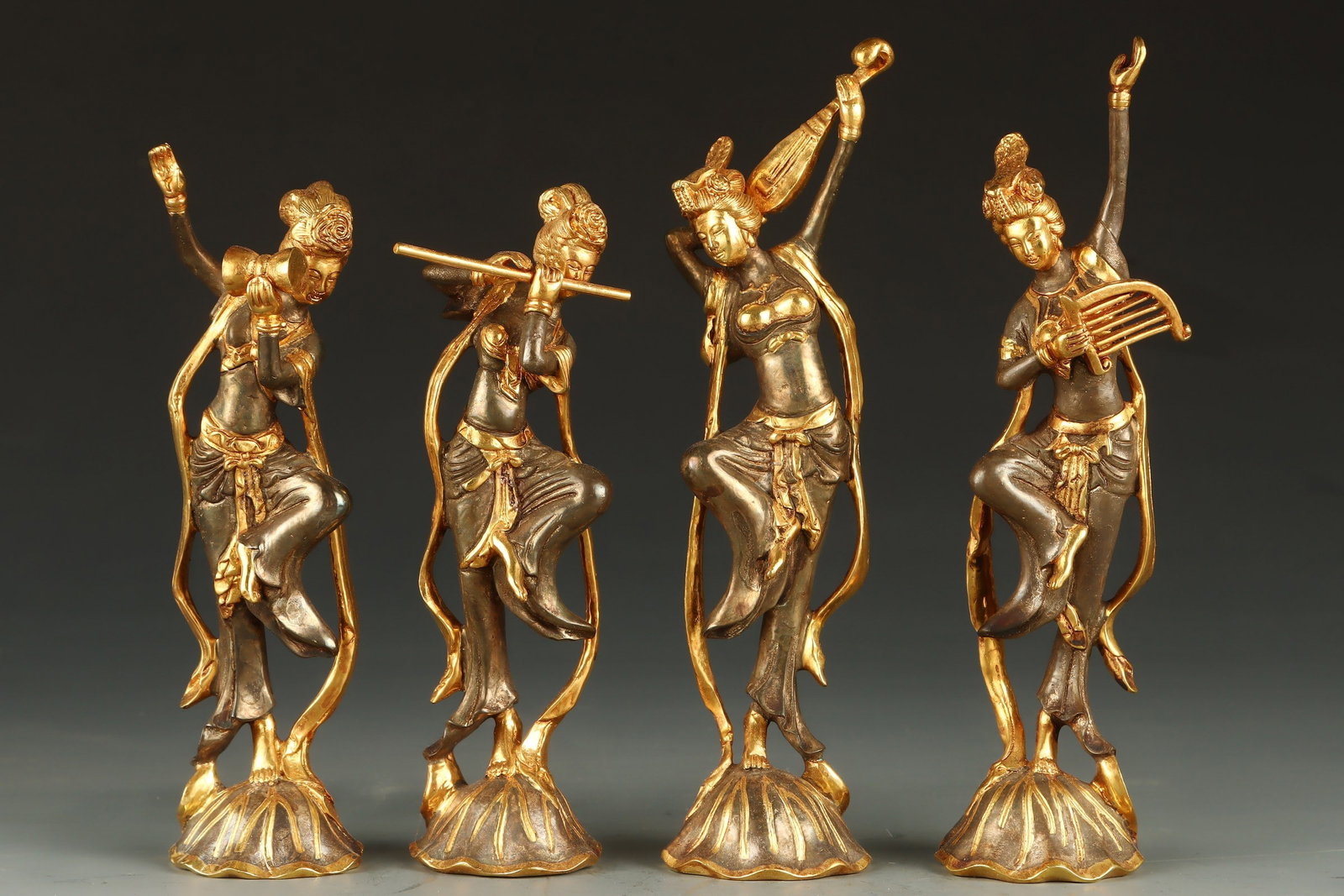 A Set of Fine Gilt Bronze Figure Ornaments: A Set of Fine Gilt Bronze Figure Ornaments,Tang Dynasty,China,Size:(Highest)7.1in,(Lowest )6.1inx1.8in,Total