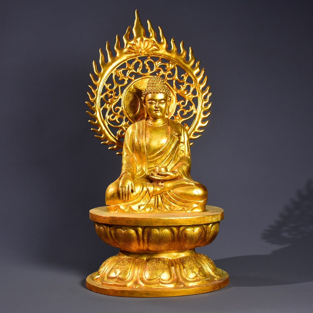 A Solemn Gilt Bronze Buddha Statue: A Solemn Gilt Bronze Buddha Statue,Qing Dynasty,China,Size:11.8inx6.5inx4.9in,Weight:1981g铜鎏金佛像,中国清代,Size:30cmx16.5cmx12.5cm,Weight:1981g