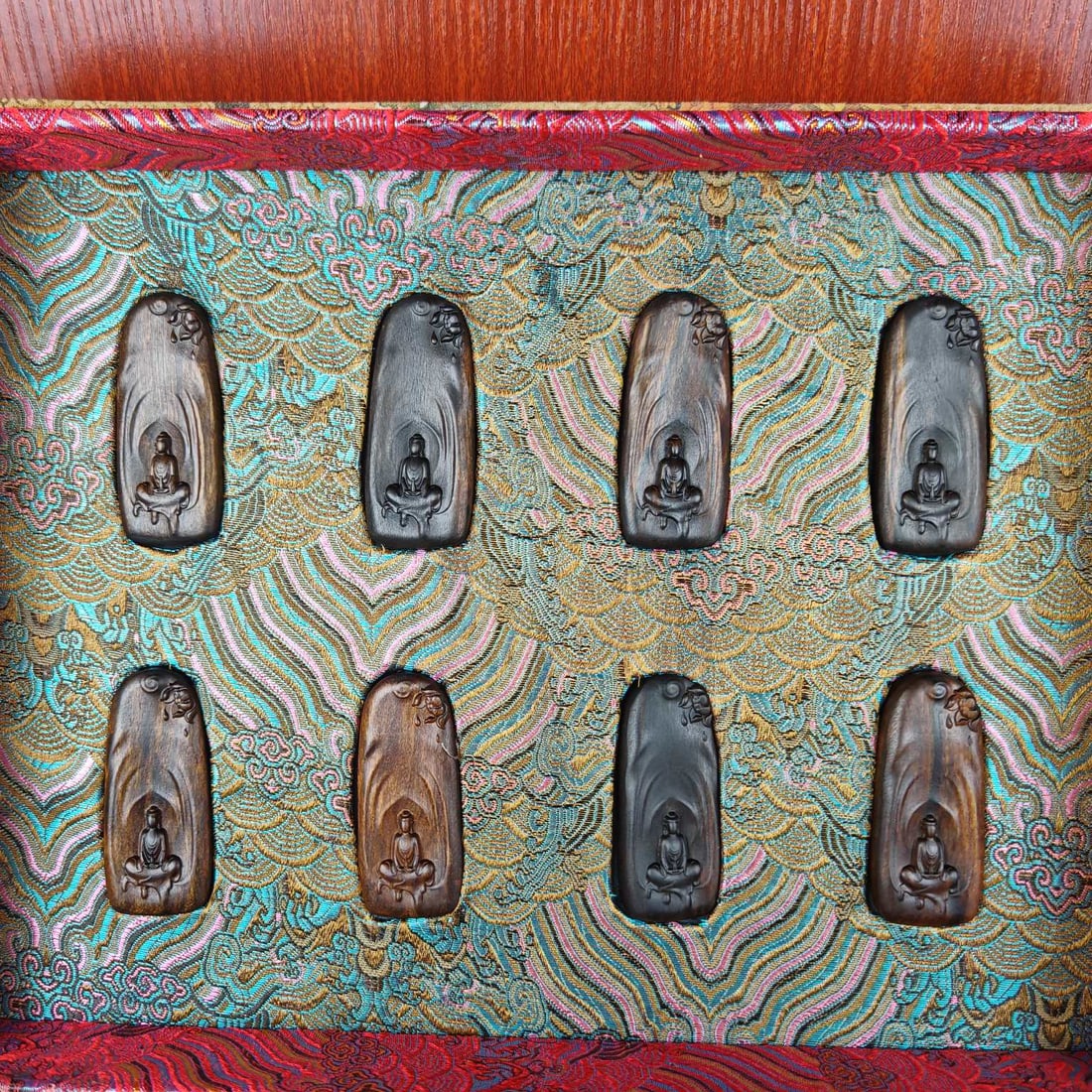 A Set of Fine Eaglewood Buddha Statua Pattern Pendants: A Set of Fine Eaglewood Buddha Statua Pattern Pendants,Qing Dynasty,ChinaSize:2.6in一套沉香木佛像纹挂件,中国清代,Siz