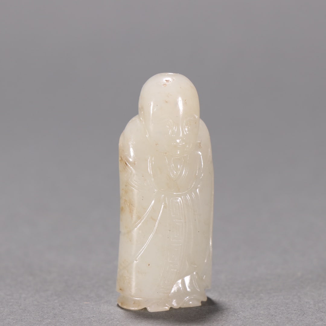 An Exquisite White Jade Figure Pendant: An Exquisite White Jade Figure Pendant,Qing Dynasty,China,Size:1.8inx0.7in,Weight:21.6g白玉人物挂件,中国清代,Size:4.6cmx1.8cm,Weight:21.6g