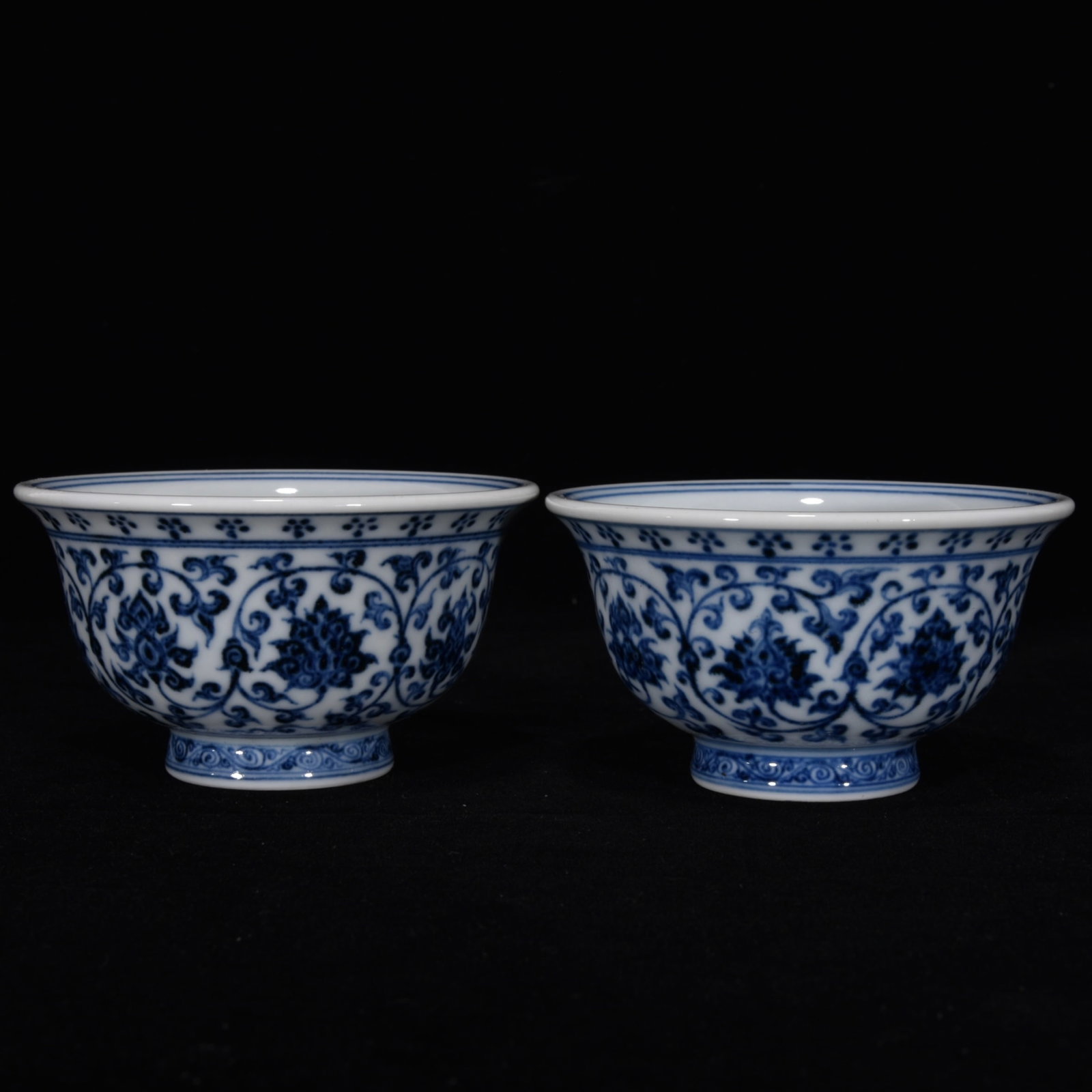 An Exquisite Blue and White Lotus Pattern Lion Pattern Cup: An Exquisite Blue and White Lotus Pattern Lion Pattern Cup Ming Dynasty, China Yongle Four-character Mark Size:2inx9.cm青花缠枝花卉纹压手杯 