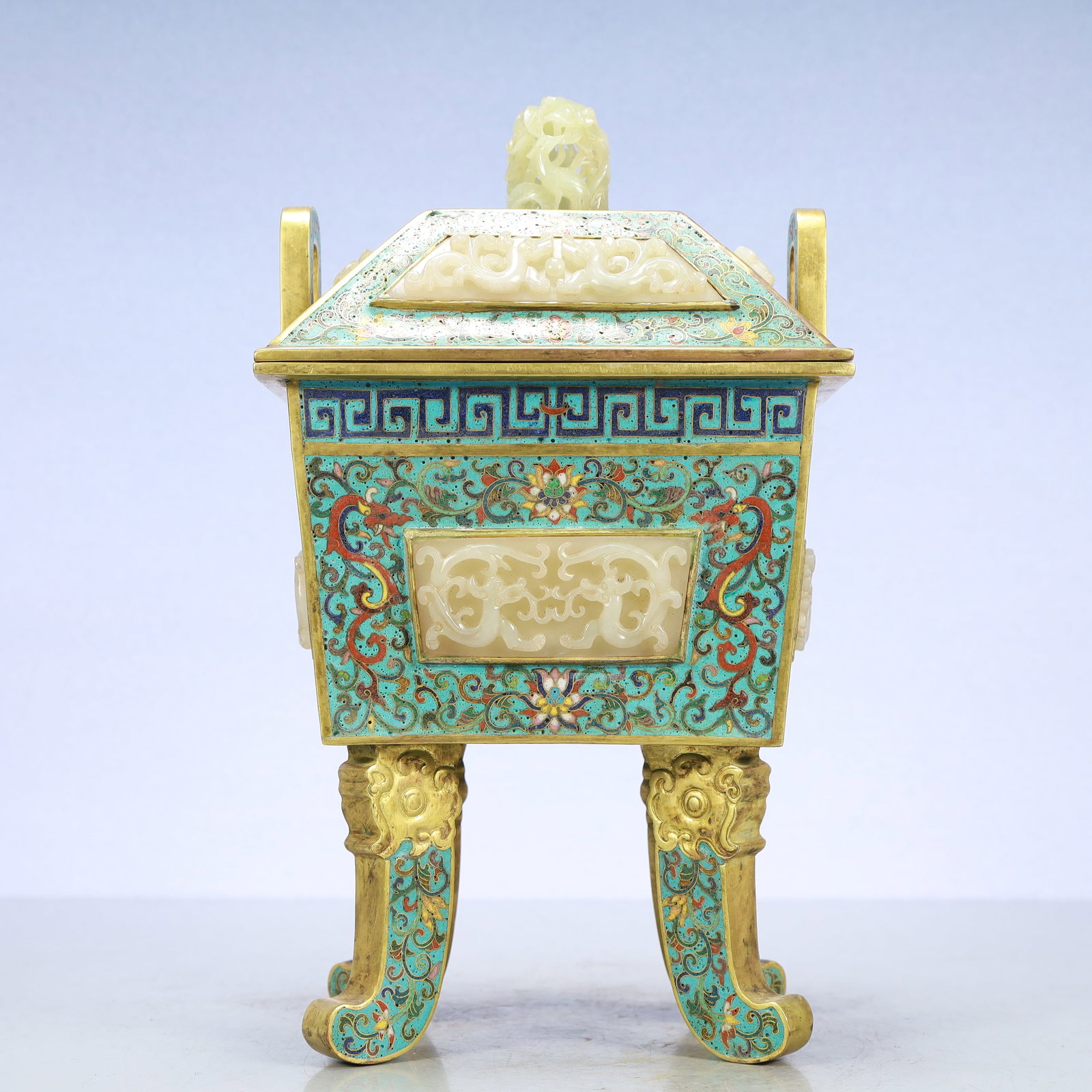 A Exquisite Cloisonne Inlaid White Jade Lotus Pattern Dragon Pattern Double-Ears Censer: A Exquisite Cloisonne Inlaid White Jade Lotus Pattern Dragon Pattern Double-Ears Censer Qing Dynasty, China Qianlong Four-character Mark Size:7.1inx5.5inx10.6in Weight:5100g景泰蓝