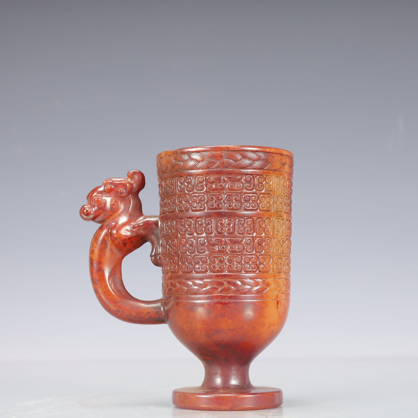 A Exquisite Gao Guyu Dragon Pattern Cup: A Exquisite Gao Guyu Dragon Pattern Cup Qing Dynasty, China Size:4.3inx2.8inx5.1in Weight:500g高古玉龙纹杯 中国清代 Size:11cmx7cmx13cm Weigh