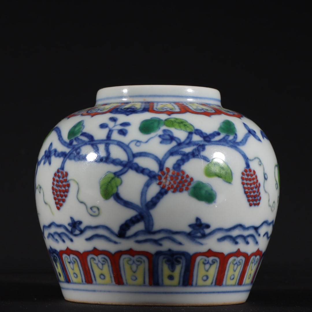 A Rare Doucai Grapes Pattern Jar: A Rare Doucai Grapes Pattern Jar Ming Dynasty, China Size:3inx3.5in中国明代 斗彩葡萄纹天字罐Size:7.6cmx9cm