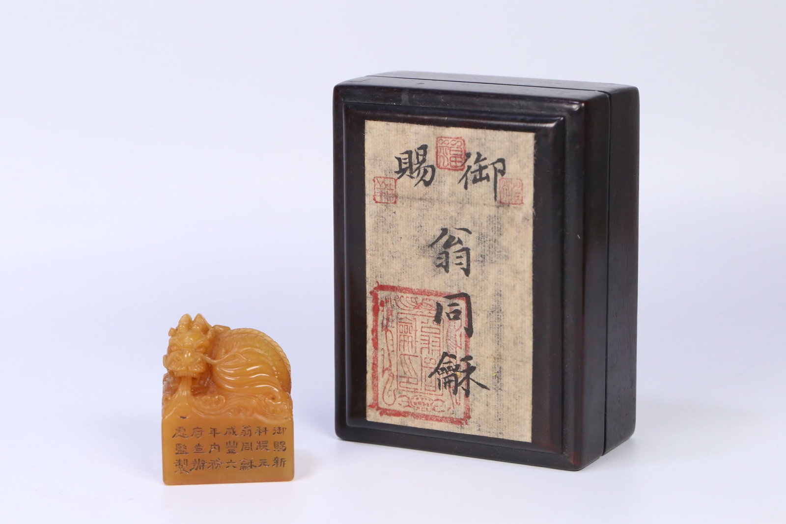 An Exquisite Tianhuang Stone Fish-Dragon Pattern Seal: An Exquisite Tianhuang Stone Fish-Dragon Pattern Seal,Qing Dynasty, China,Xianfeng MarkSize:2inx1.6inx1.3in,Weight:130.3g田黄石鱼龙纹印章,中ࢲ