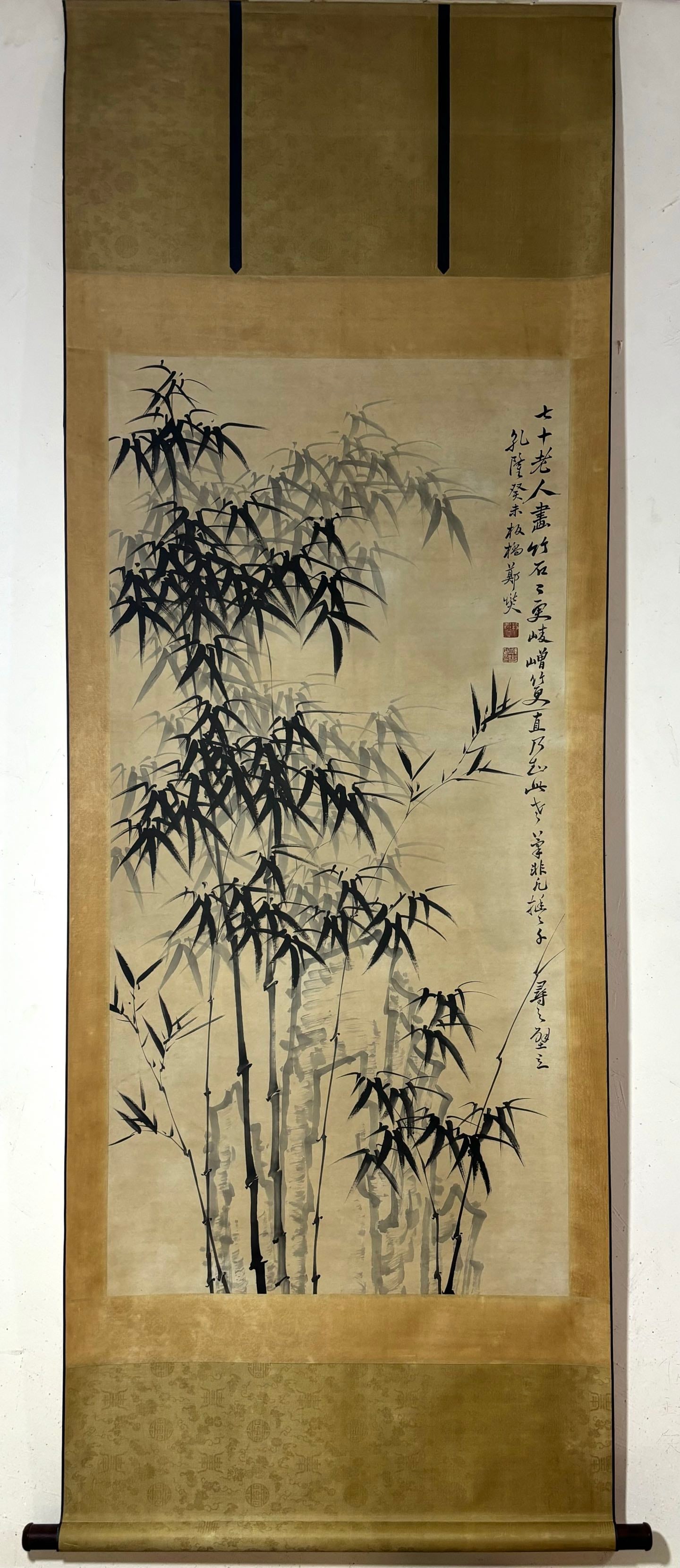 A Chinese Vertical Scroll Ink Painting of Bamboo on Paper,Zheng Banqiao: A Chinese Vertical Scroll Ink Painting of Bamboo on Paper,Zheng Banqiao,Size:(Without frame)53.5inx26.2in一幅中国水墨竹子图立轴,๻