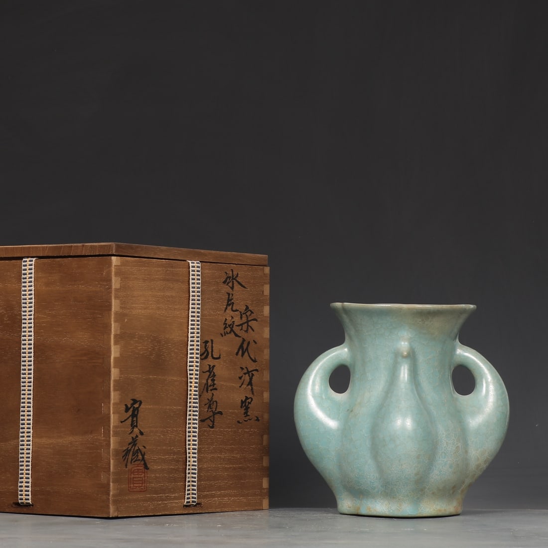 An Exquisite Ru yao Peacock-Shaped Vase: An Exquisite Ru yao Peacock-Shaped Vase,Song Dynasty, ChinaSize:6.4inx4.4inx6.3in汝窑孔雀形瓶,中国宋代,Size:16.2cmx11.2cmx16cm