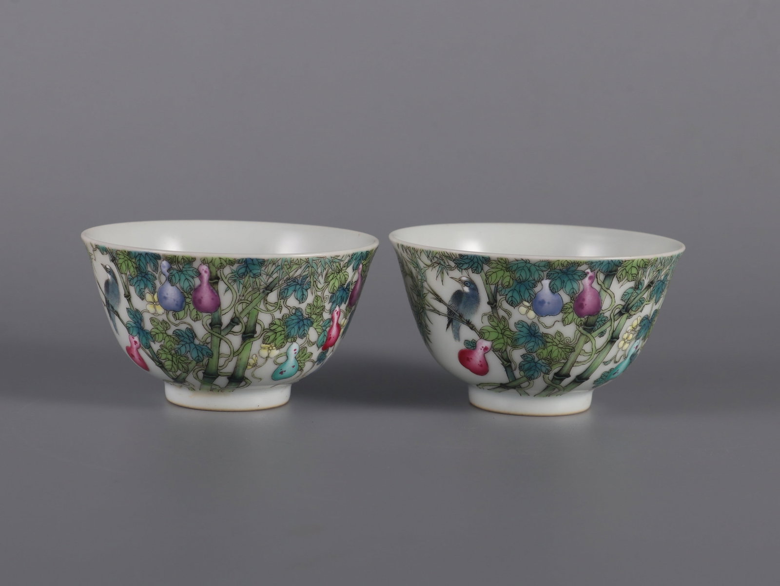 A Pair of Exquisite Famille-Rose Flower and Bird Pattern Cup: A Pair of Exquisite Famille-Rose Flower and Bird Pattern Cup Qing Dynasty, China Size:1.7inx3in一对粉彩花鸟纹杯 中国清代 Size:4.