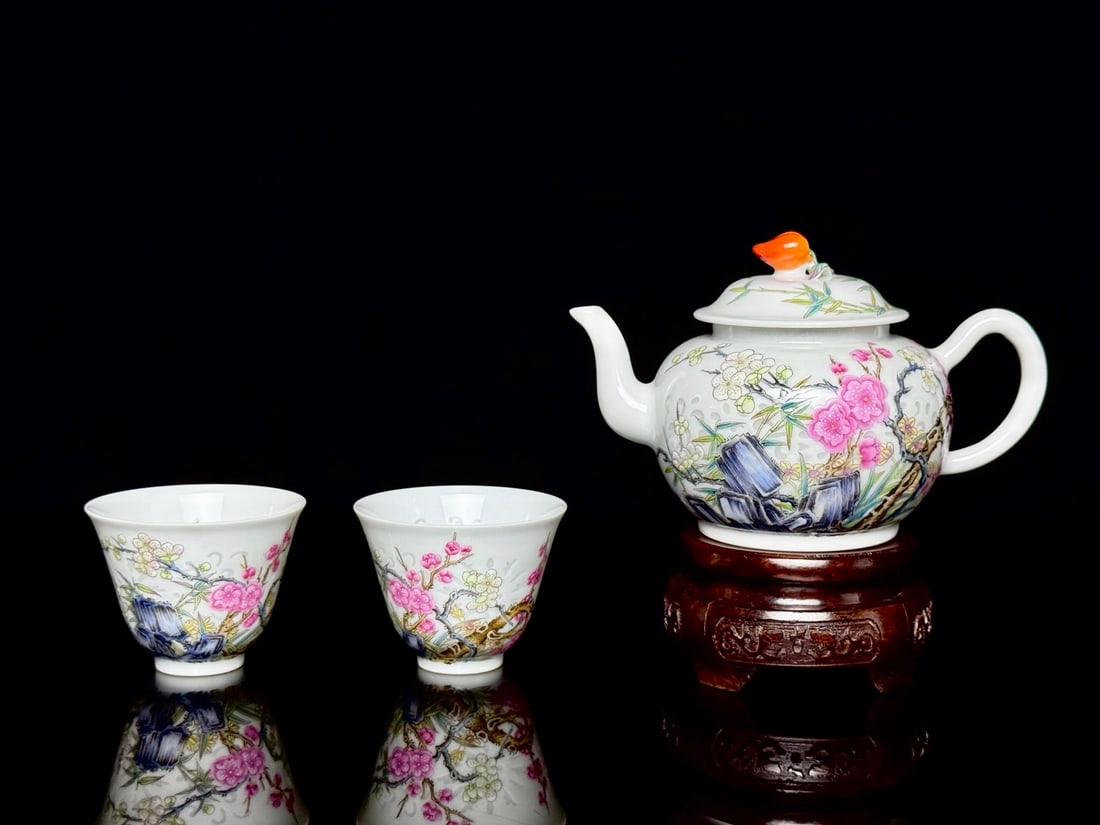 A Set of Fine Enamel Plum Blossom and Bamboo Pattern Teaware: A Set of Fine Enamel Plum Blossom and Bamboo Pattern Teaware,Qing Dynasty,China,Yongzheng Four-character Mark,Size:(Teapot)3.5inx3.3inx2.3in,(Cup)2.4inx1.9inx1in一套珐琅彩
