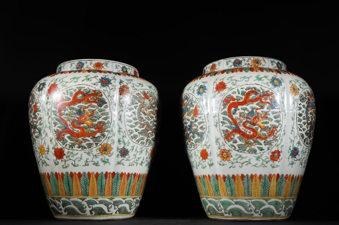 A Pair of Exquisite Wucai Dragon Pattern Seawater Pattern Lotus Pattern Jar: A Pair of Exquisite Wucai Dragon Pattern Seawater Pattern Lotus Pattern Jar Ming Dynasty, China Jiajing Six-character Mark