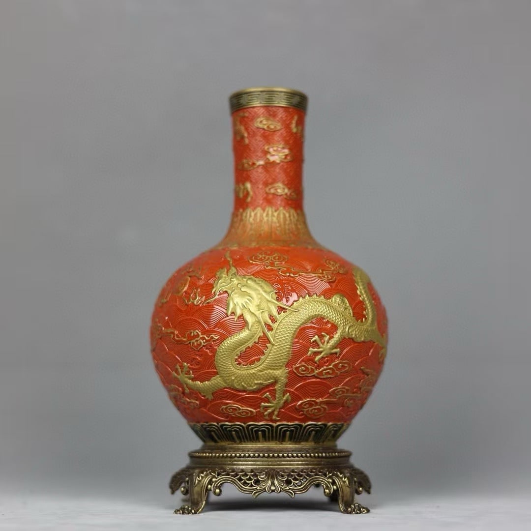 An Exquisite Coral Red Ground Painted Gold Inlaid Bronze Seawater,Auspicious Cloud and Dragon: An Exquisite Coral Red Ground Painted Gold Inlaid Bronze Seawater,Auspicious Cloud and Dragon Pattern Vase,Qing Dynasty,China,Qianlong Six-character