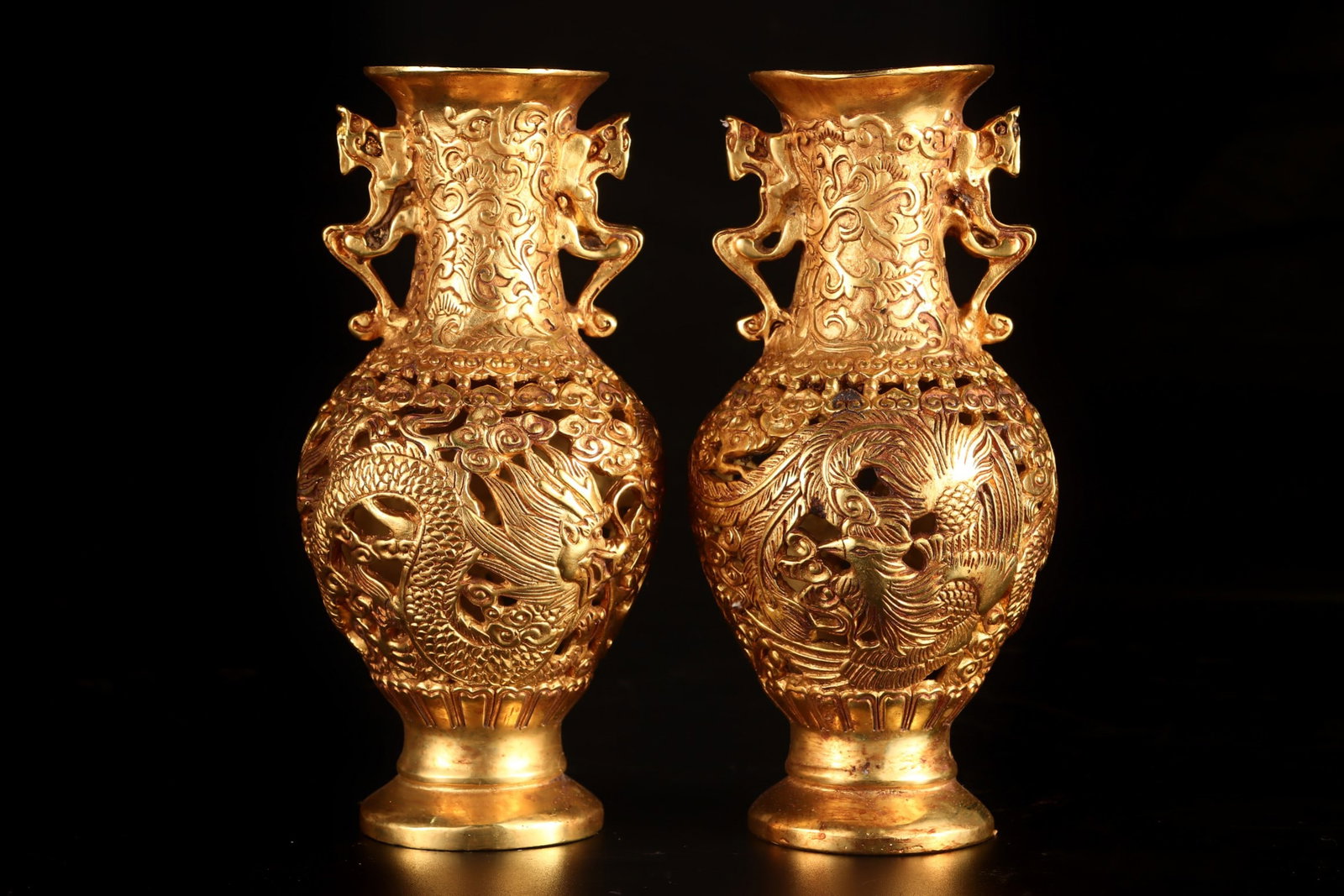 A Pair of Exquisite Gilt Bronze Hollow Dragon and Phoenix Pattern Double-Ears Vases: A Pair of Exquisite Gilt Bronze Hollow Dragon and Phoenix Pattern Double-Ears Vases,Qing Dynasty,China,Qianlong Four-character Mark,Size:7.3inx3.3in,Total Weight:1153g一对铜鎏&